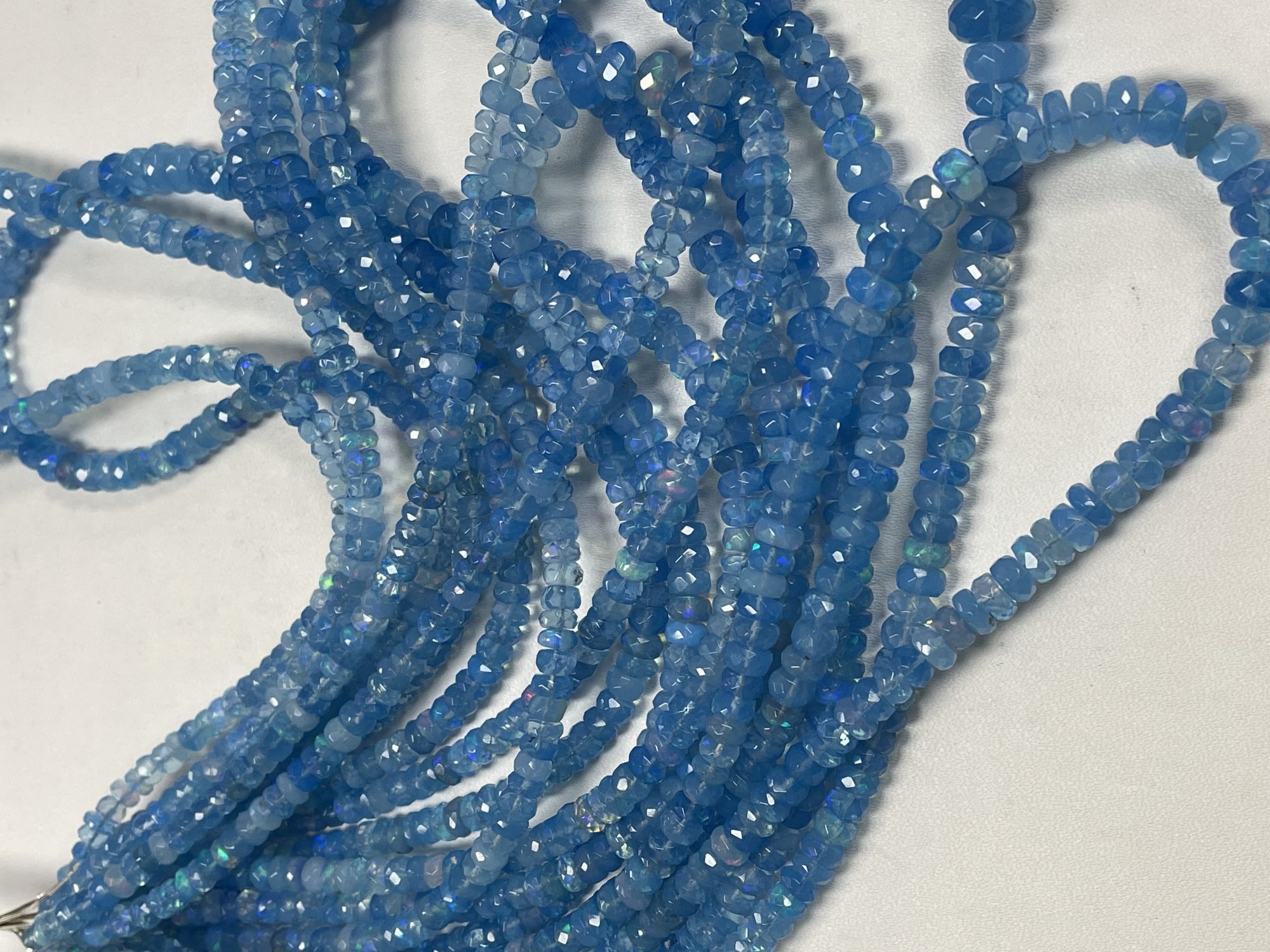 Blue Ethiopian Opal Rondelle Faceted