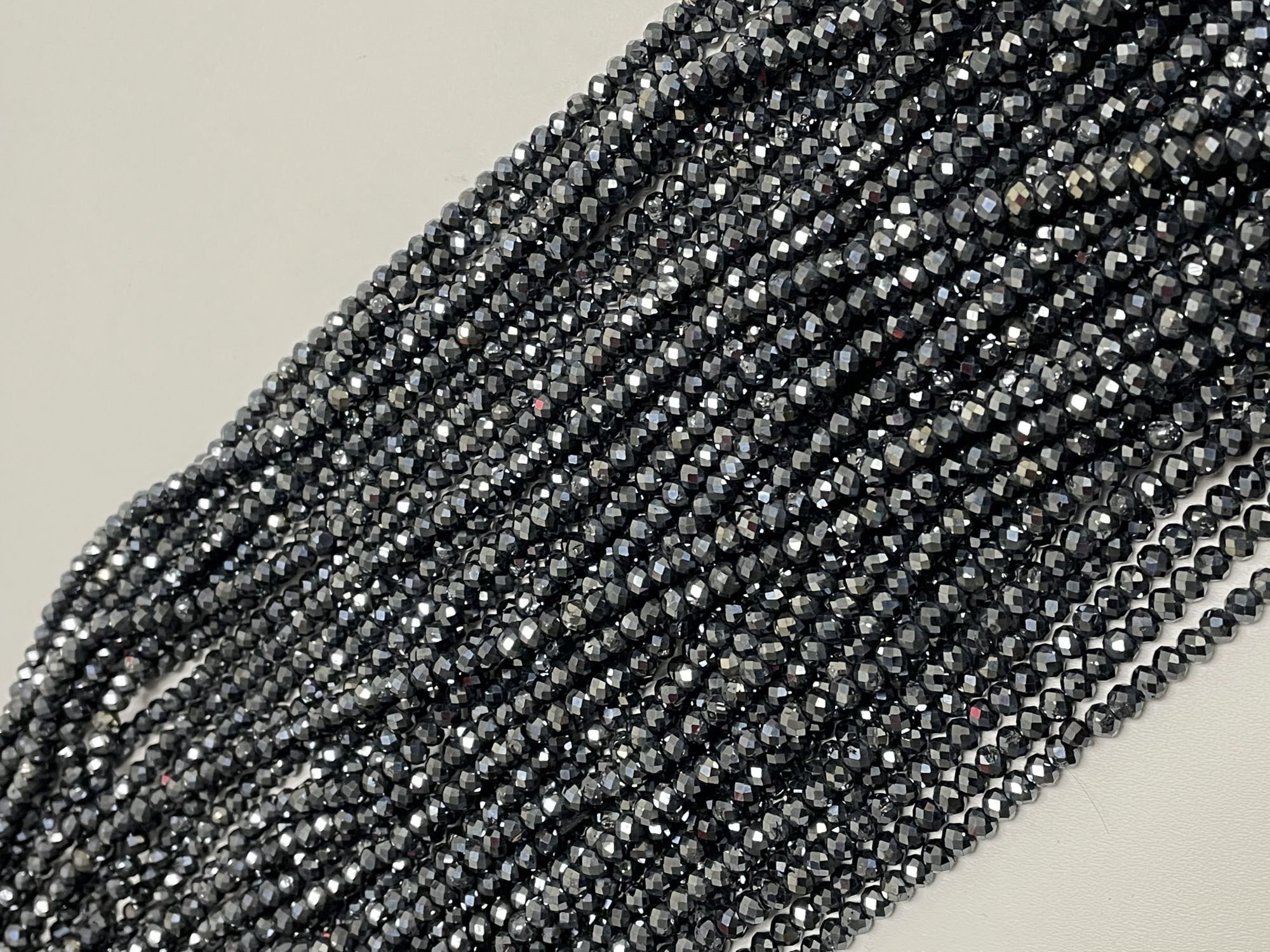 Coated Black Spinel Rondelle Faceted