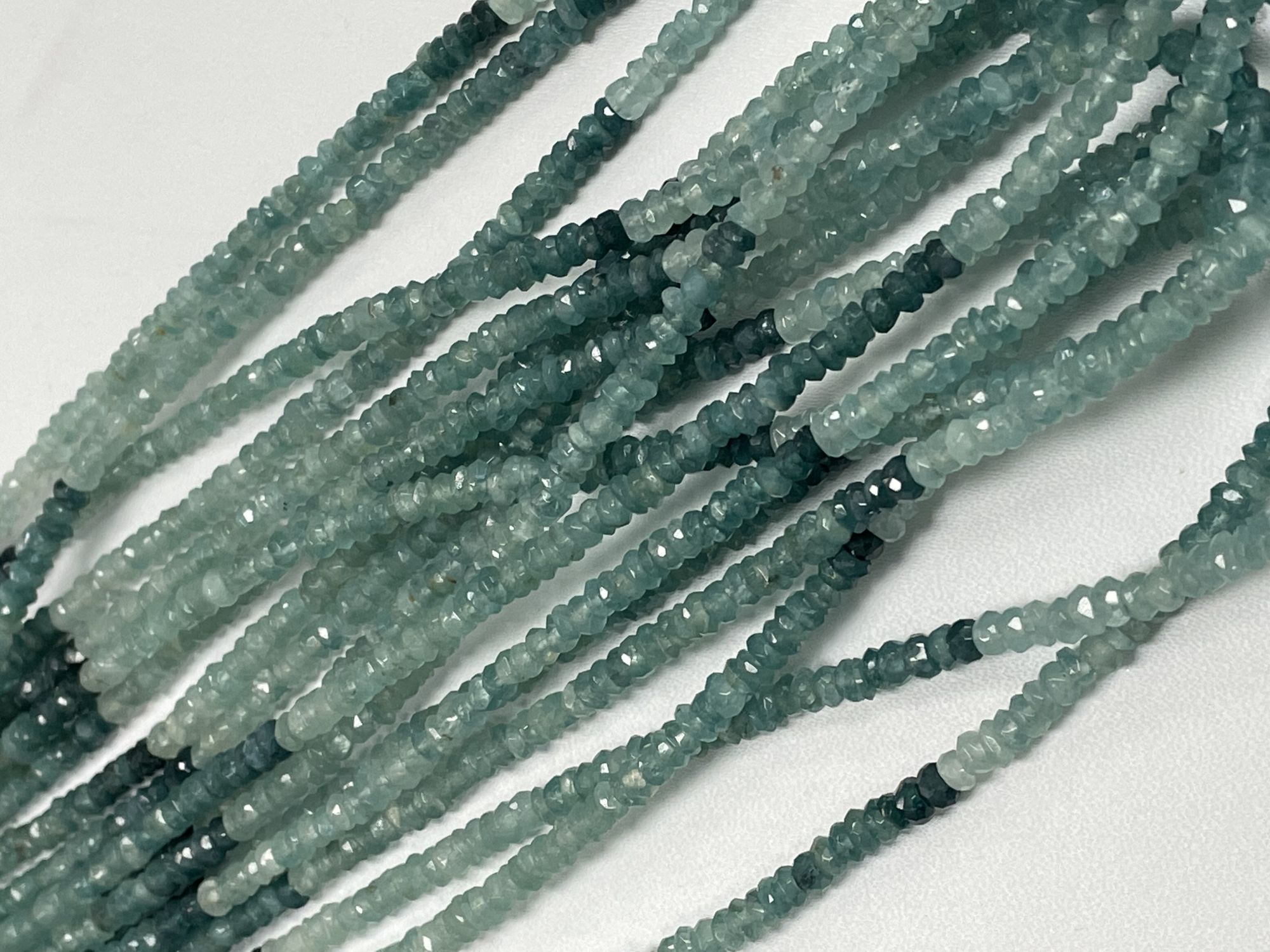 Shaded Grandidierite Rondelle Faceted