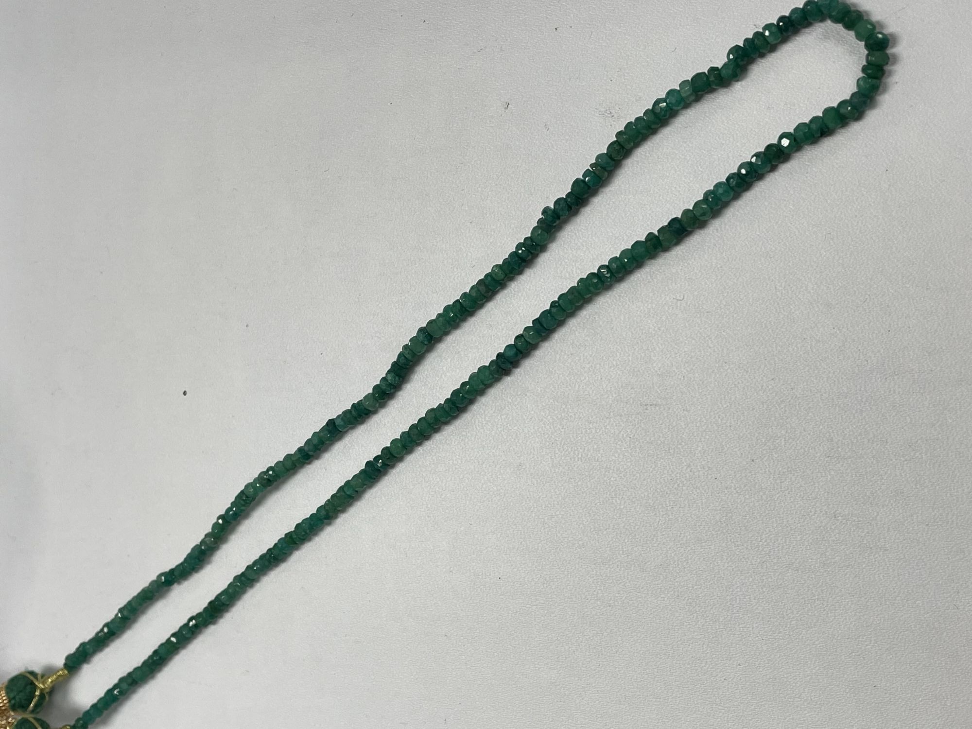 Emerald Rondelle Faceted