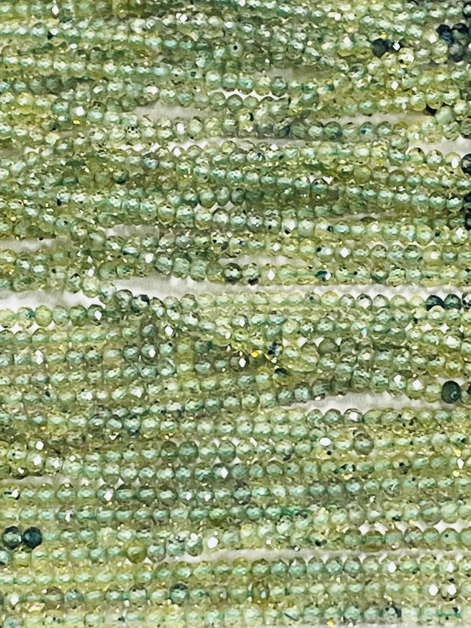 Shaded Green Sapphire Rondelle Faceted