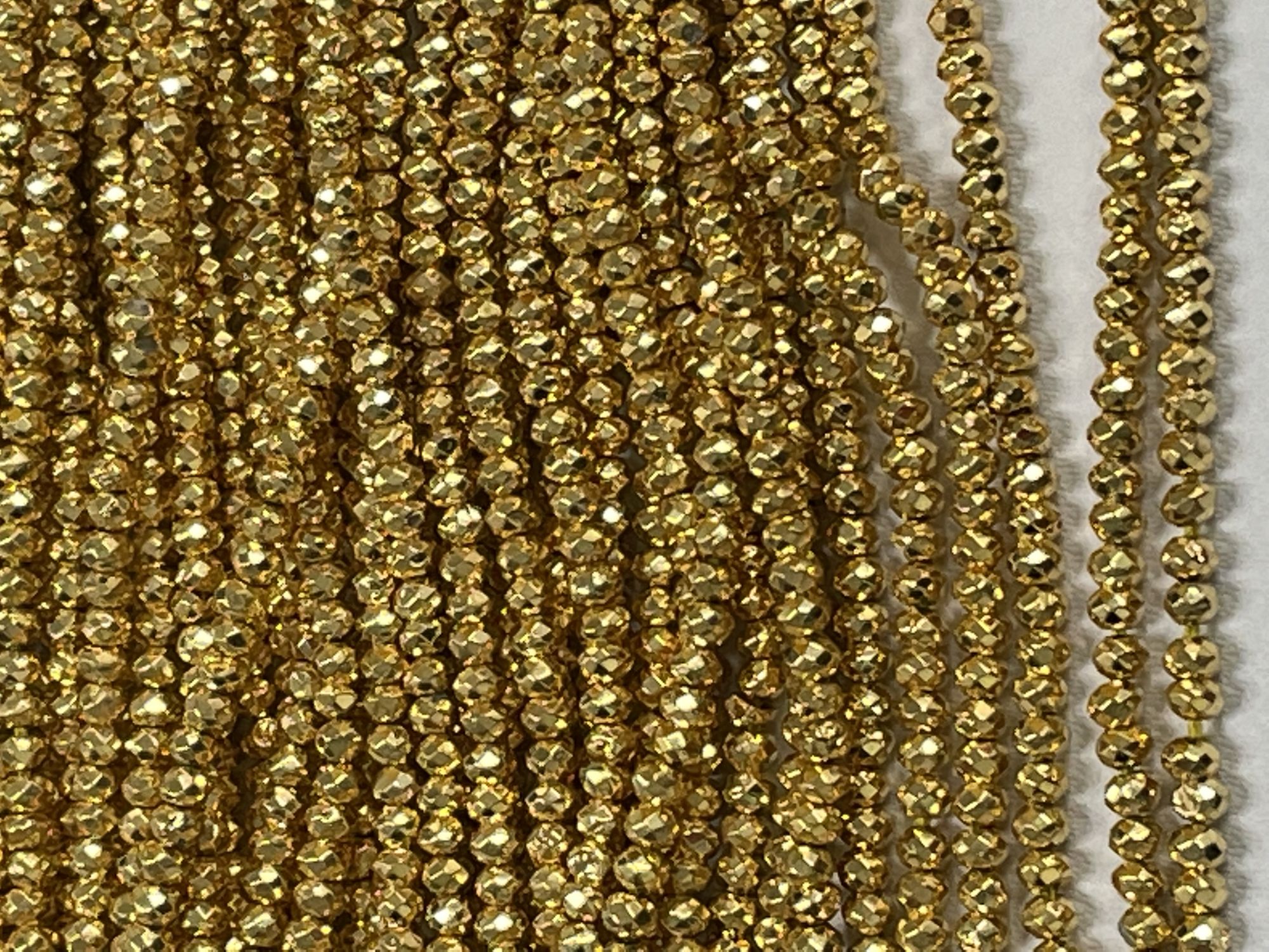 Coated Pyrite Rondelle Faceted