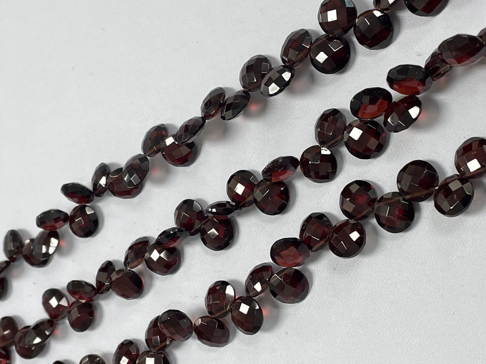 Red Garnet Coin Faceted