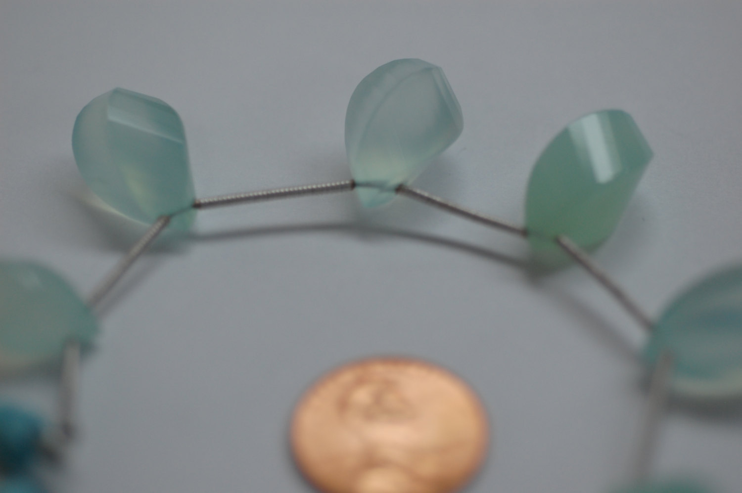 Aqua Chalcedony Twisted Drop Faceted