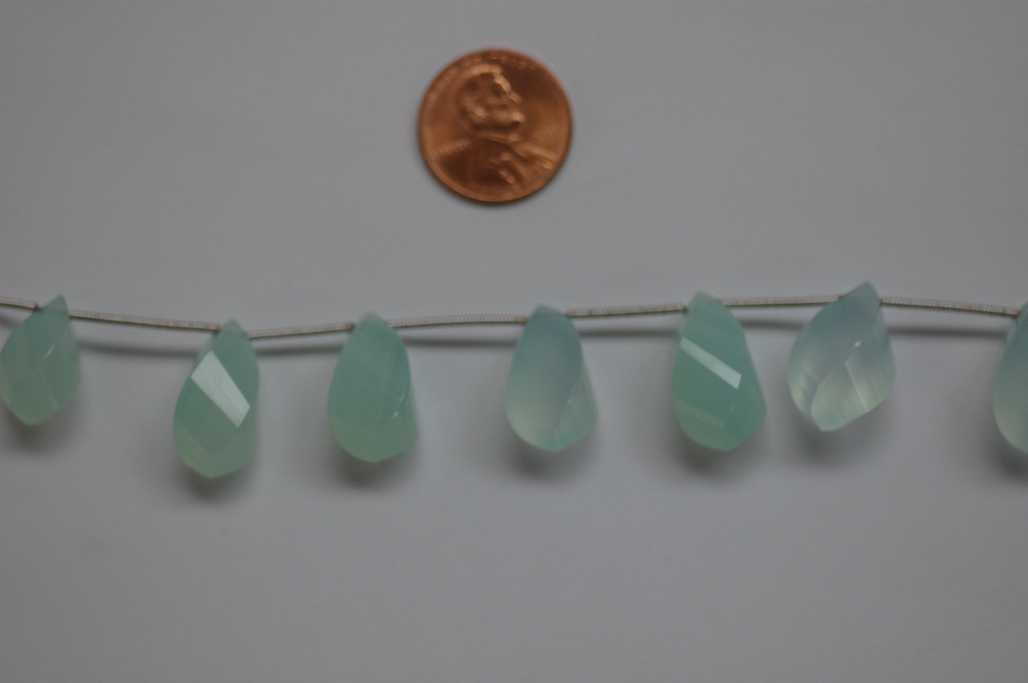 Aqua Chalcedony Twisted Drop Faceted