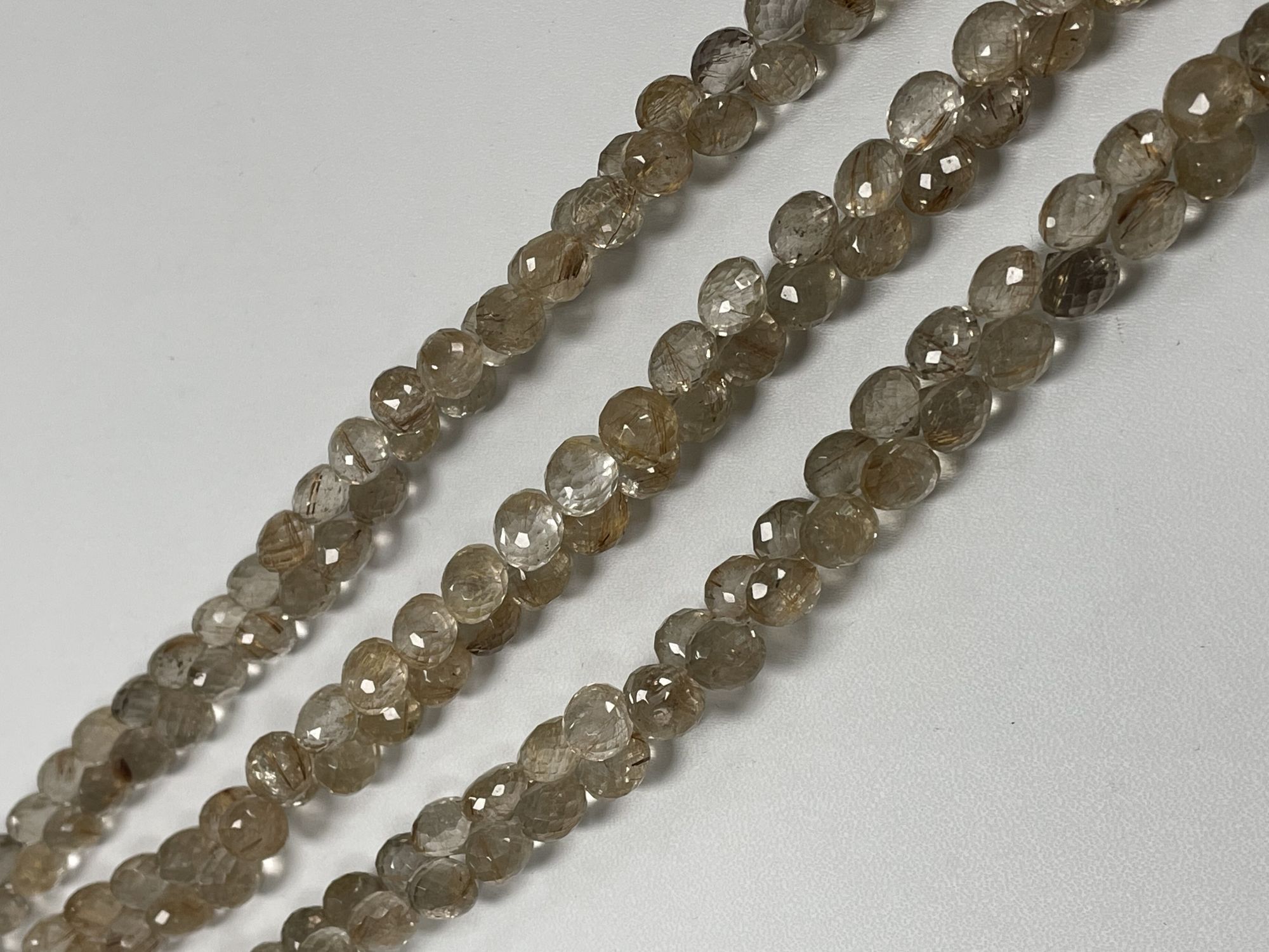 Golden Rutilated Quartz Onion Faceted