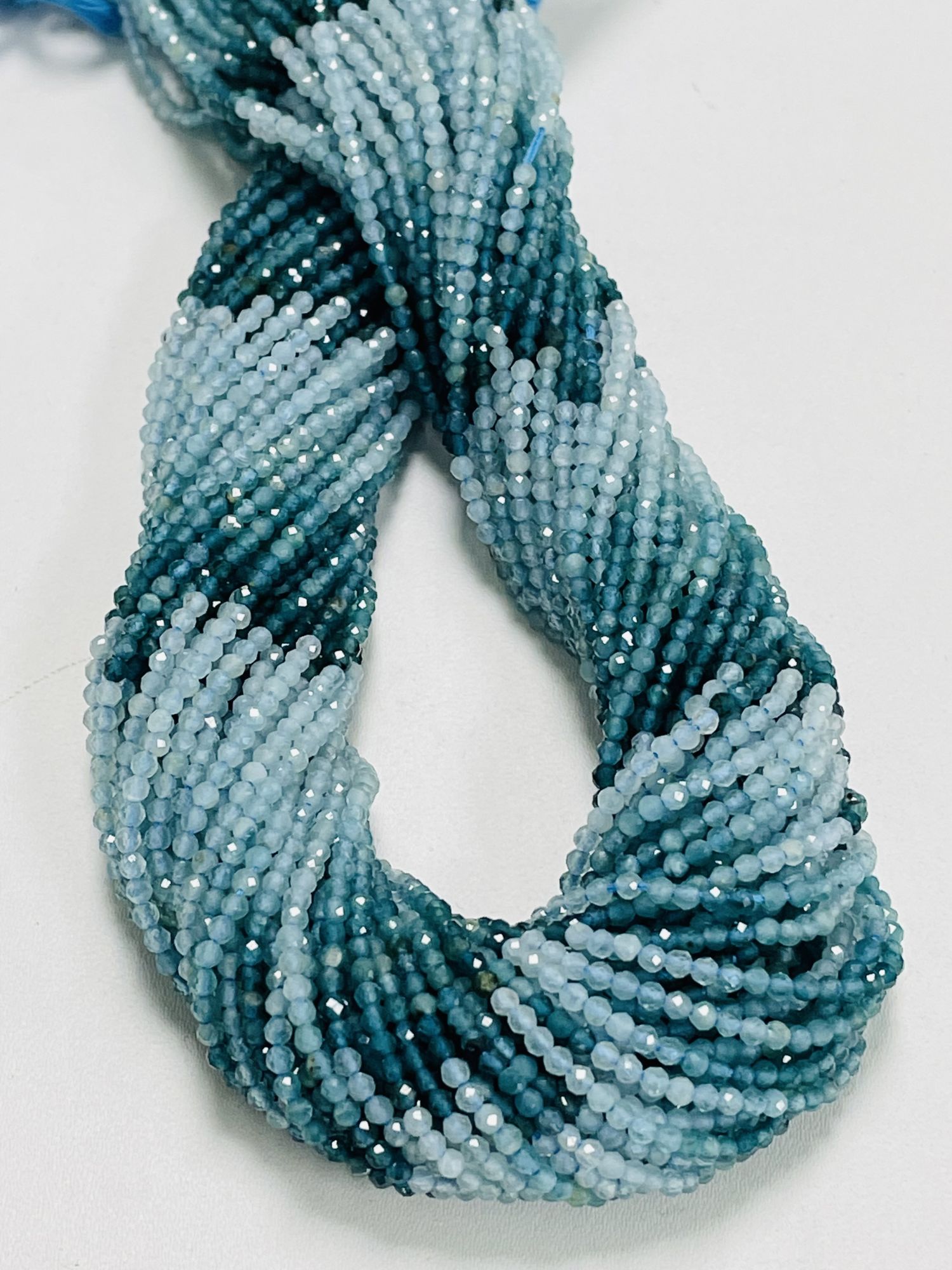 Shaded Grandidierite Rondelle Faceted