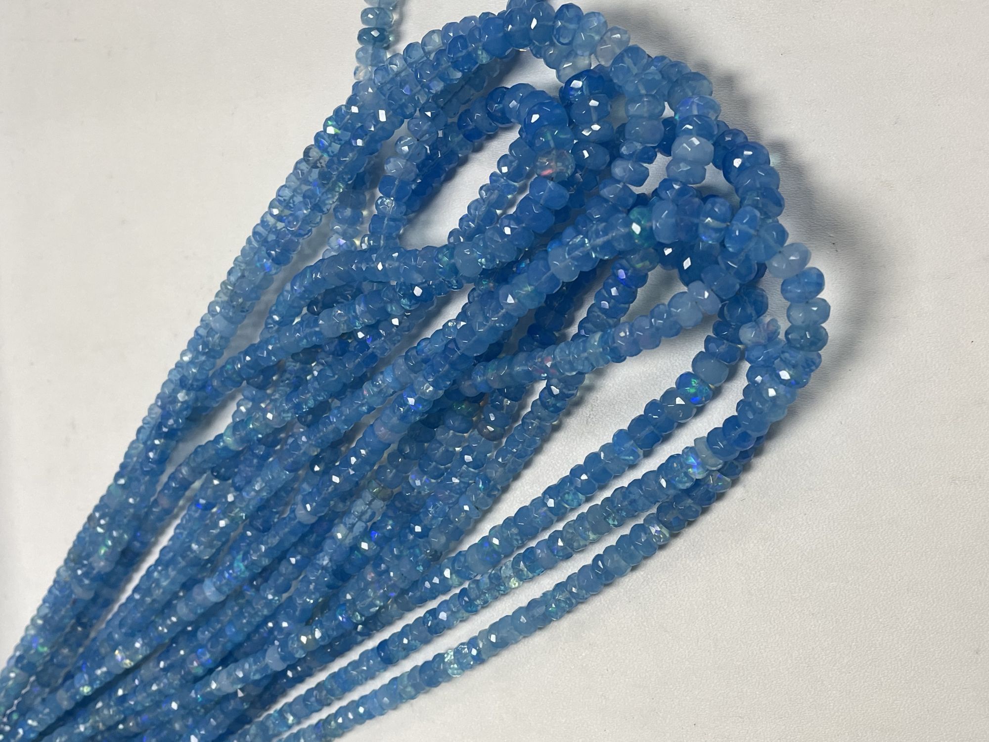 Blue Ethiopian Opal Rondelle Faceted