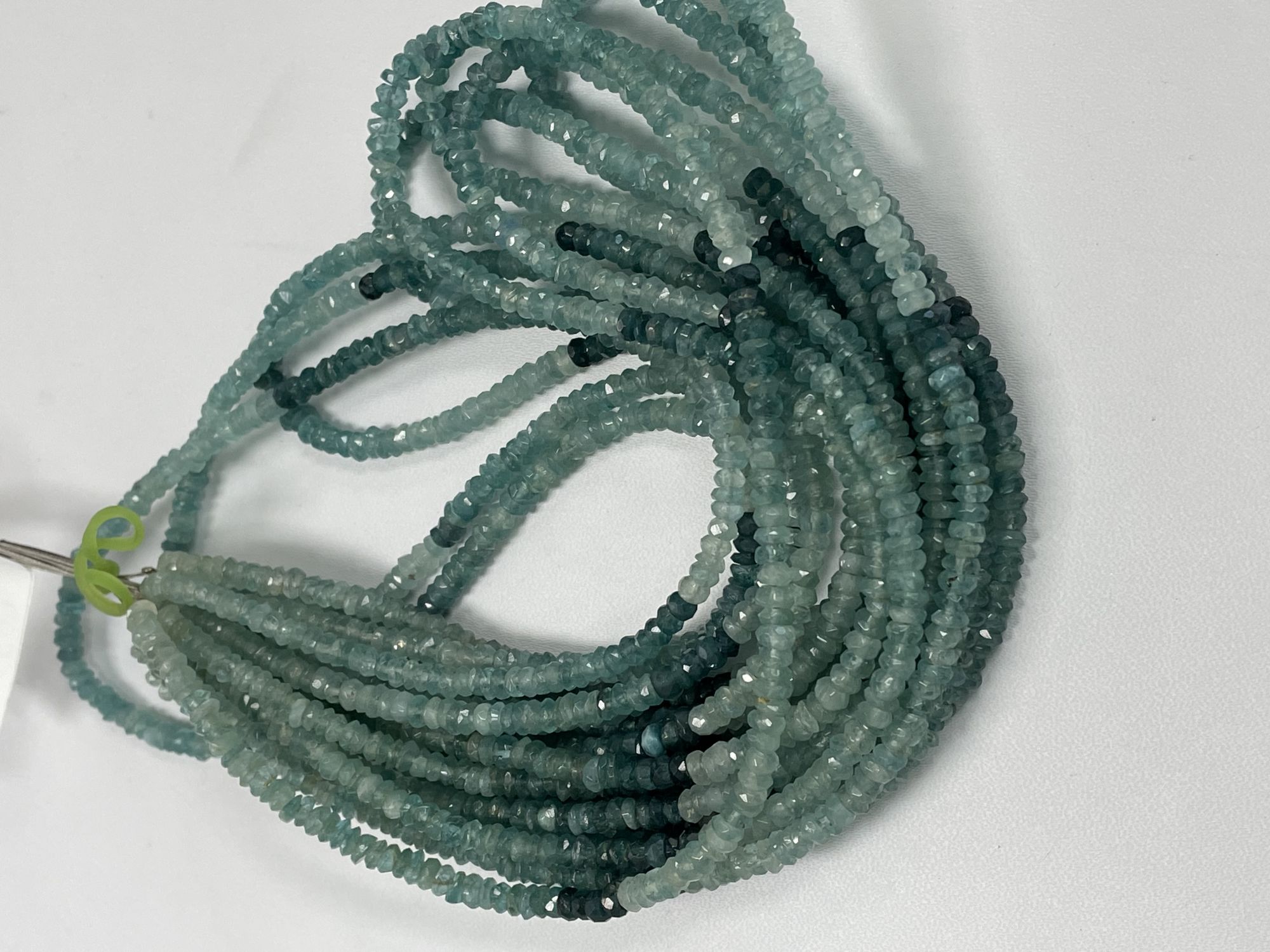 Shaded Grandidierite Rondelle Faceted