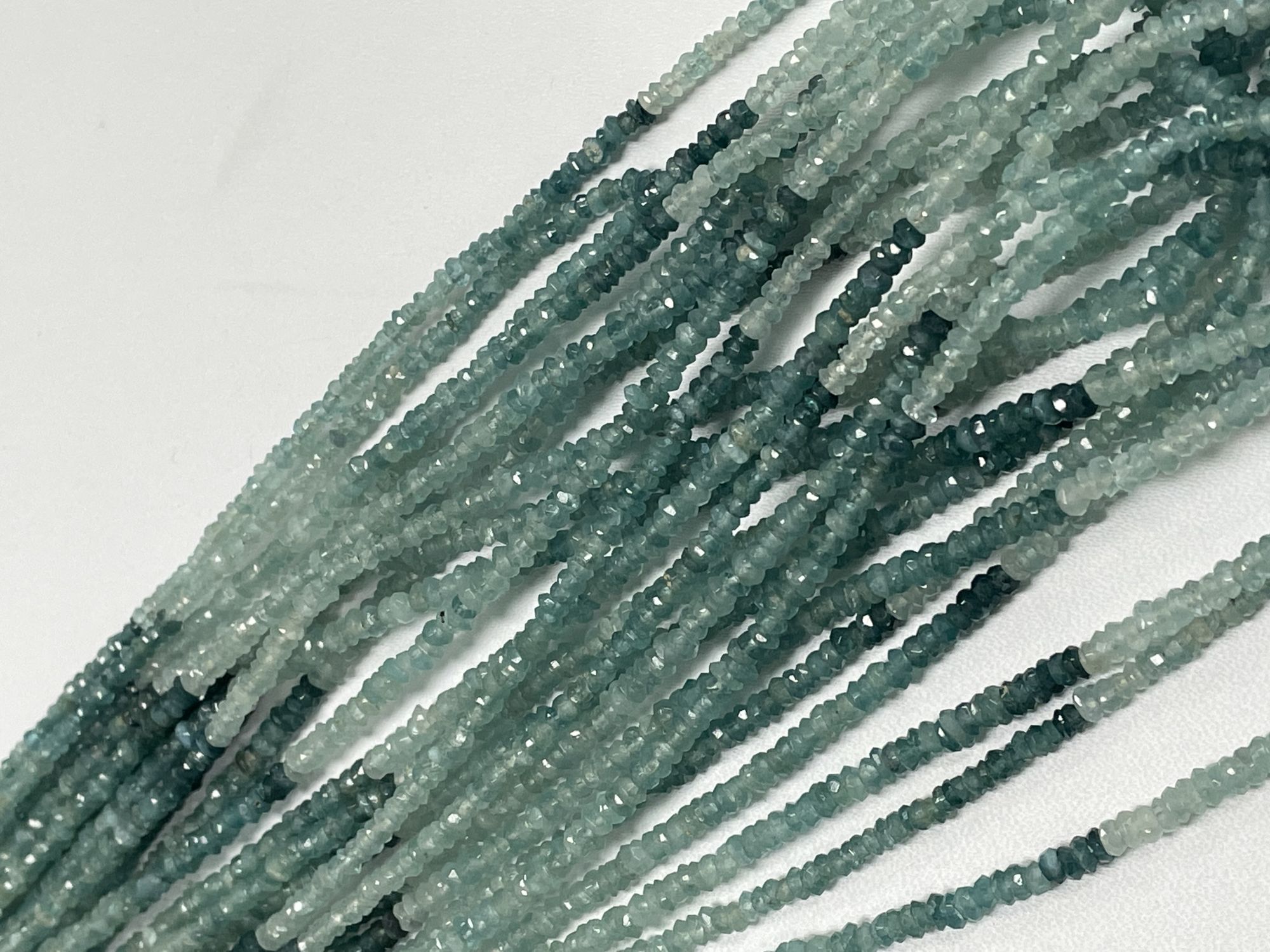 Shaded Grandidierite Rondelle Faceted