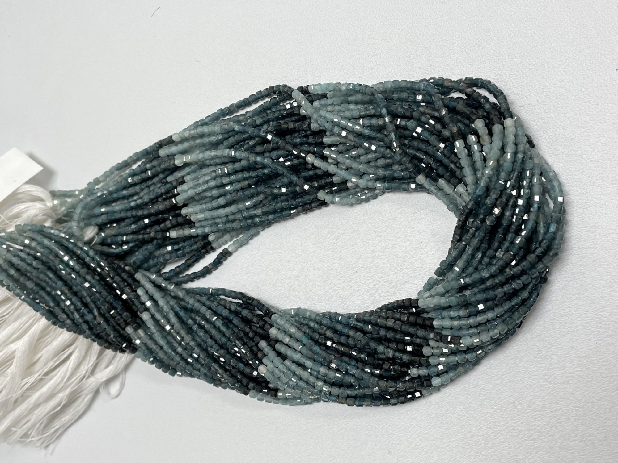 Shaded Grandidierite Rondelle Faceted