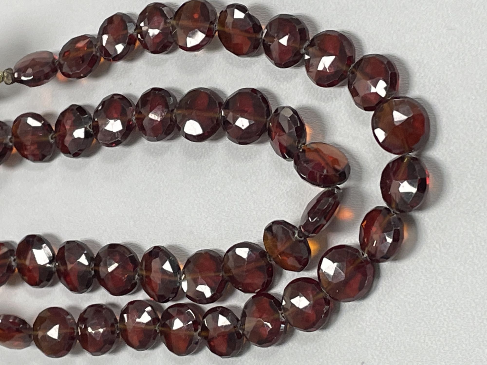 Red Garnet Coin Faceted