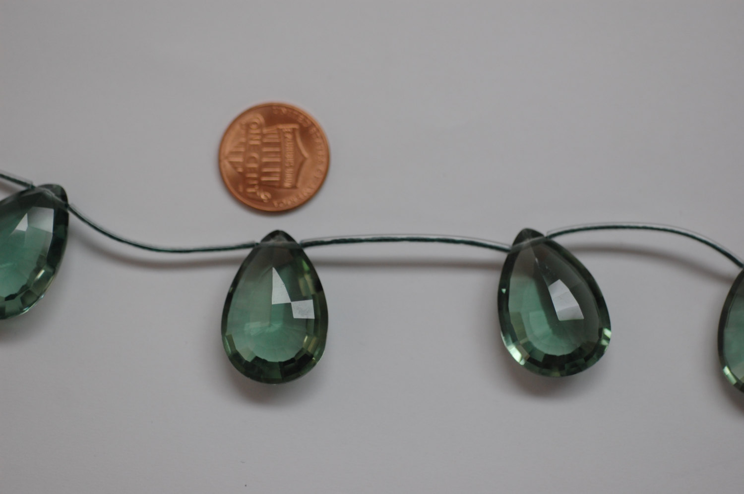 Beautiful Green Quartz Concave Cut Pear (Radiated)
