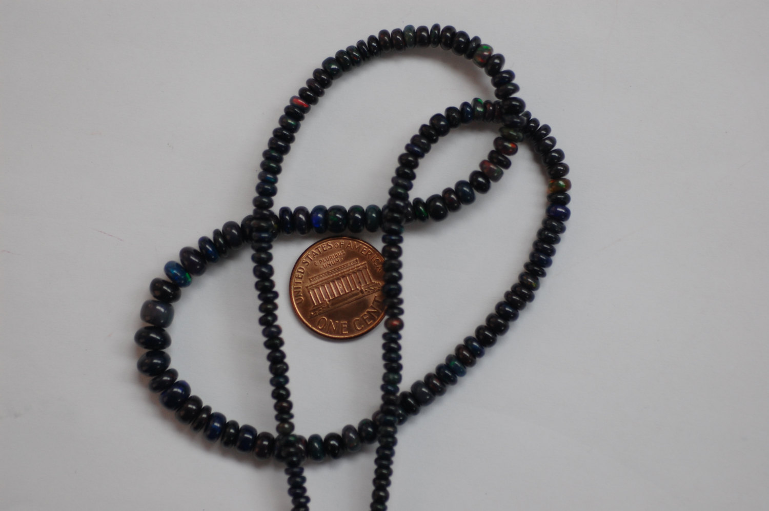 Black Opal Rondelle Smooth (Rare Color)