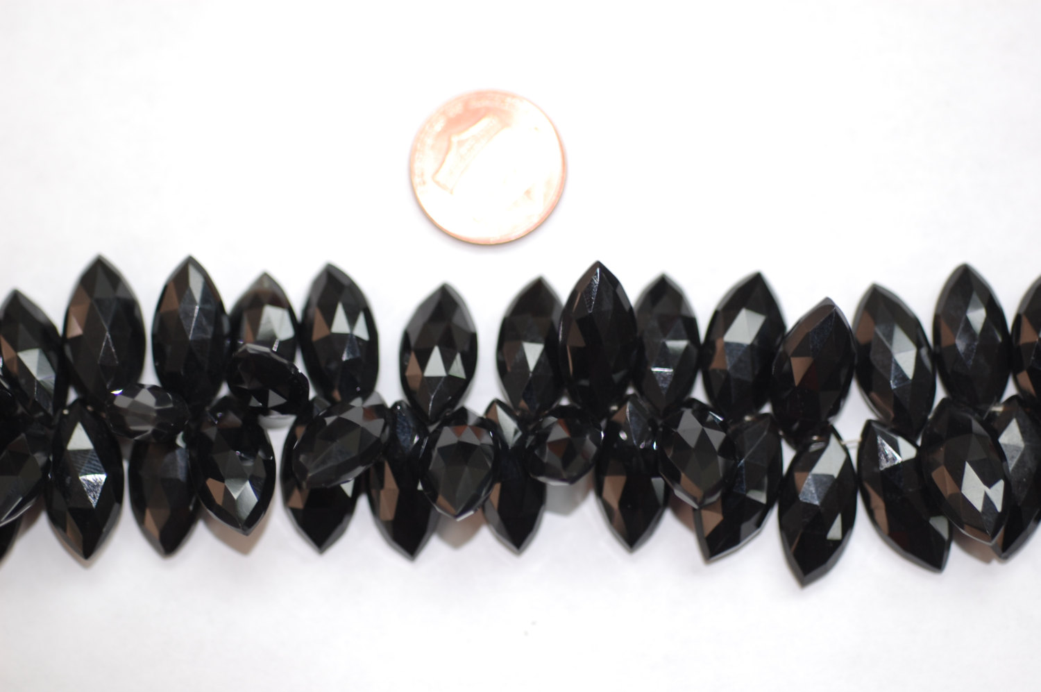 Black Spinal Marquise Faceted