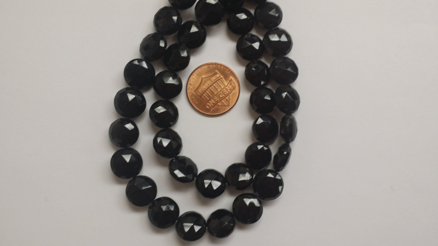 Black Spinel Coins Faceted