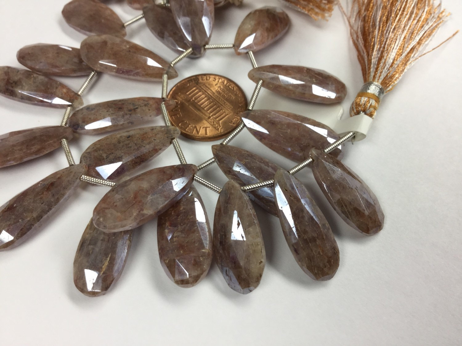 Brown Silverite Pears Faceted