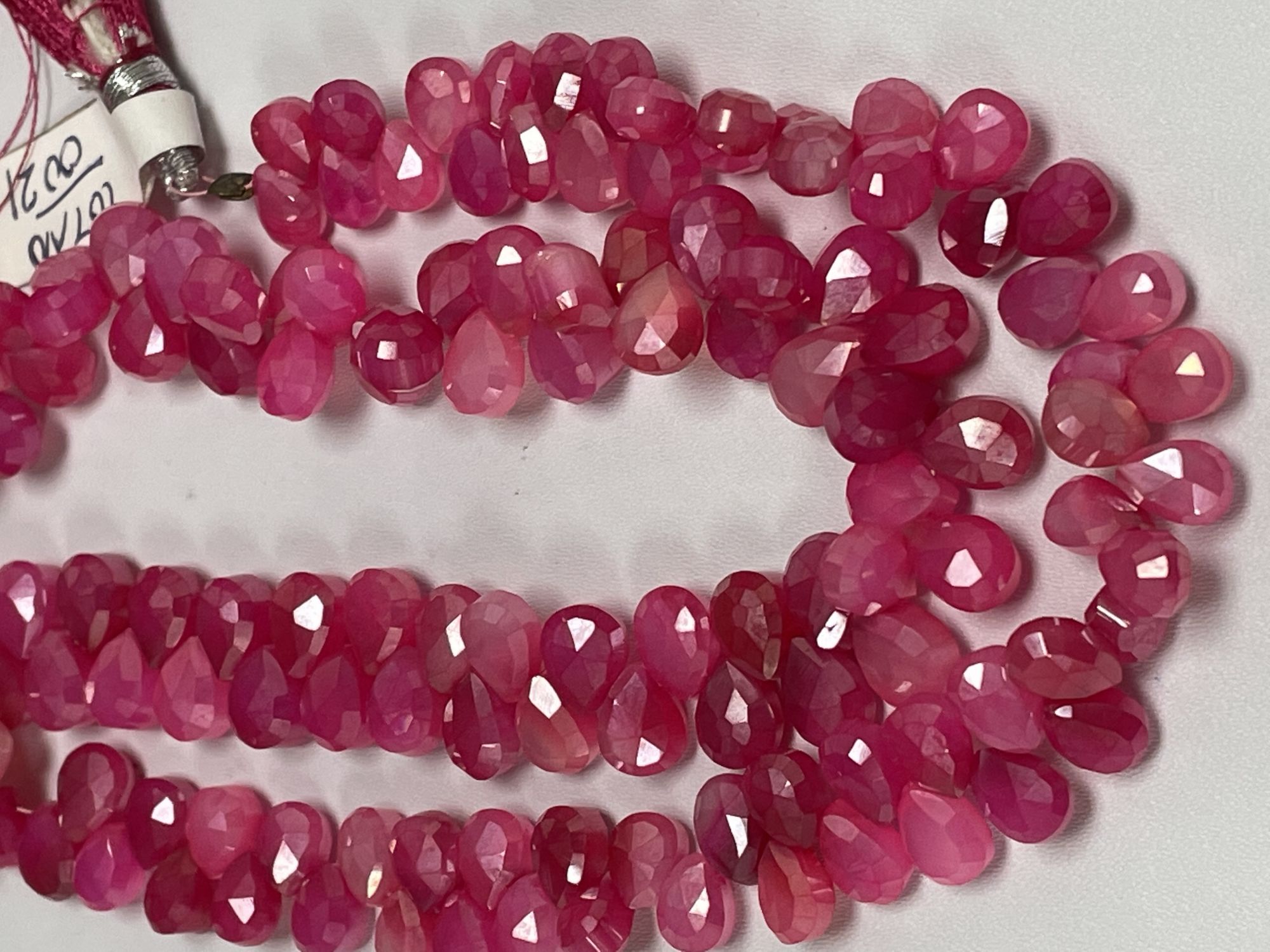 Coated Pink Chalcedony Pear Faceted