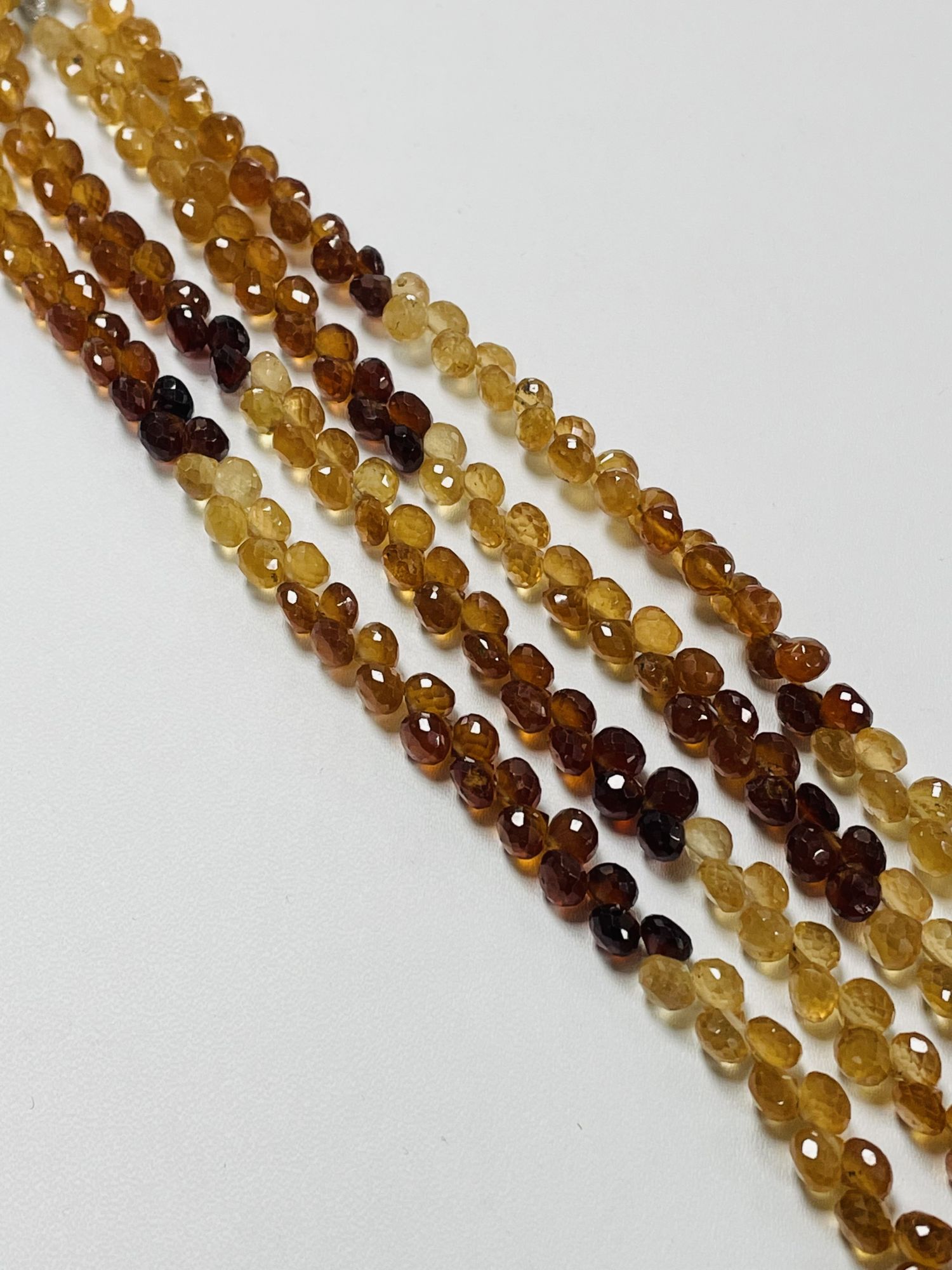 Shaded Hessonite Garnet Onion Faceted