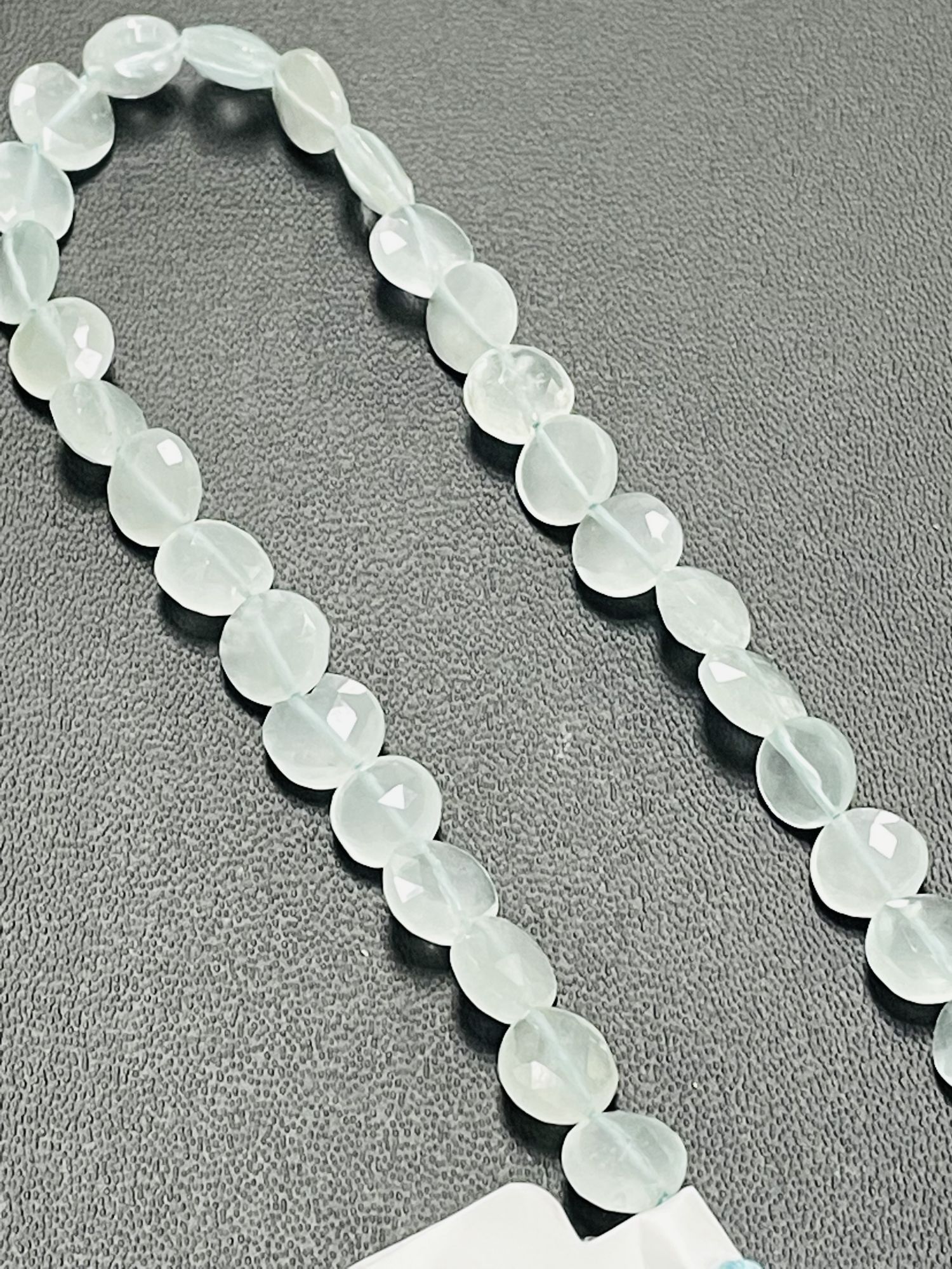 Aquamarine Coin Faceted