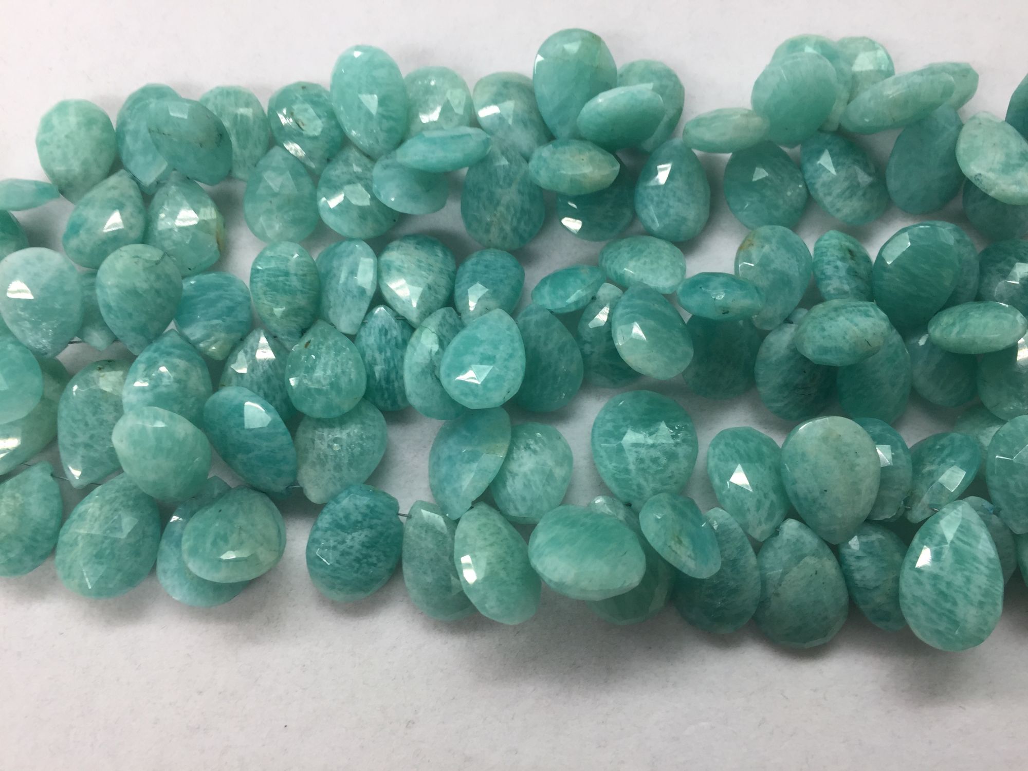 Amazonite pears faceted