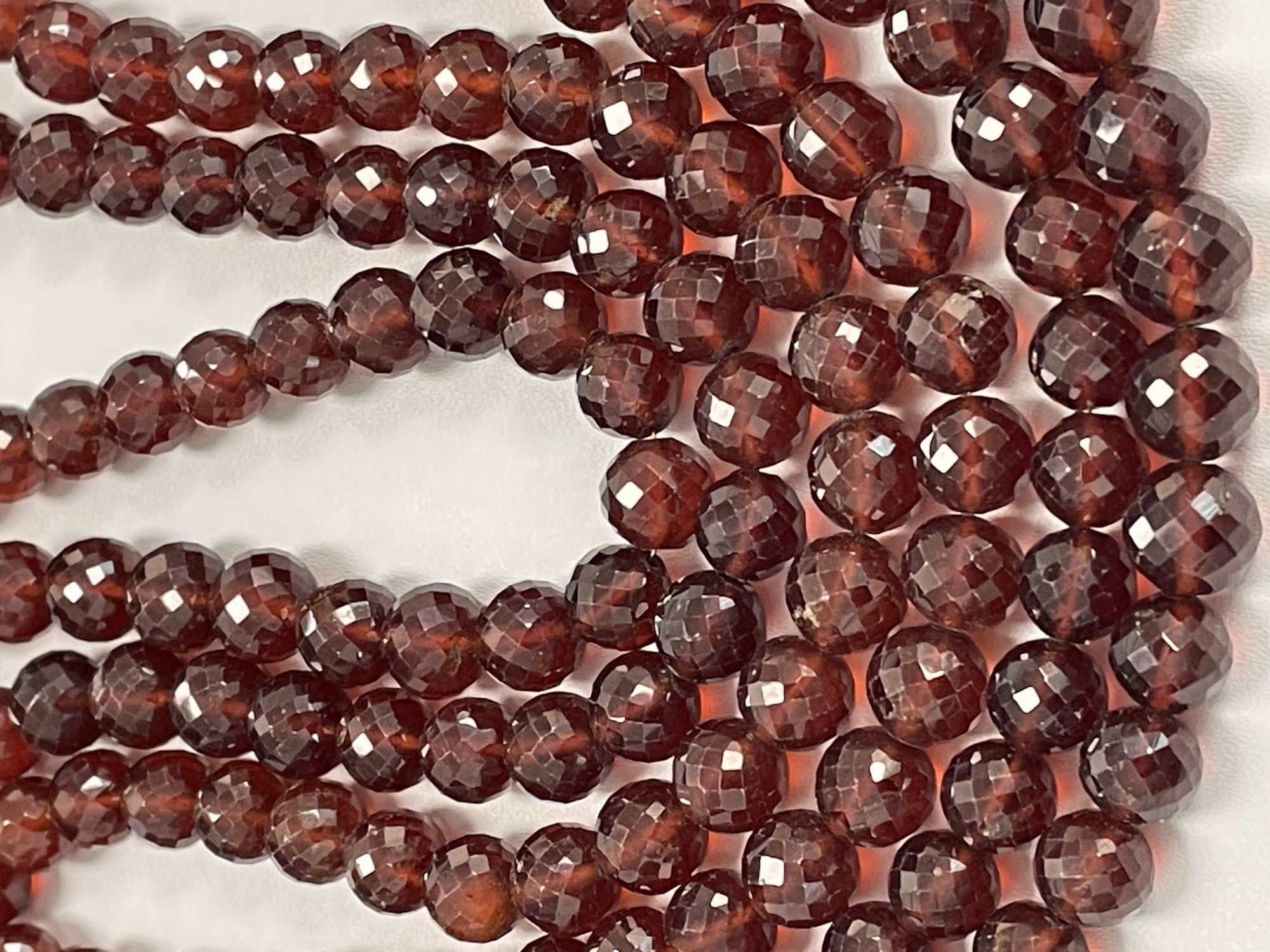 Hessonite Garnet Round Faceted