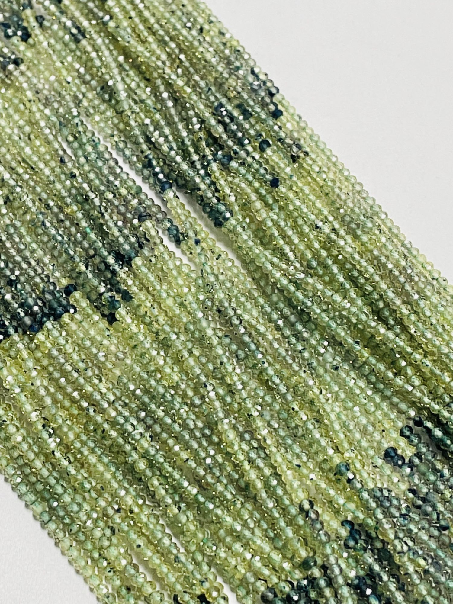 Shaded Green Sapphire Rondelle Faceted