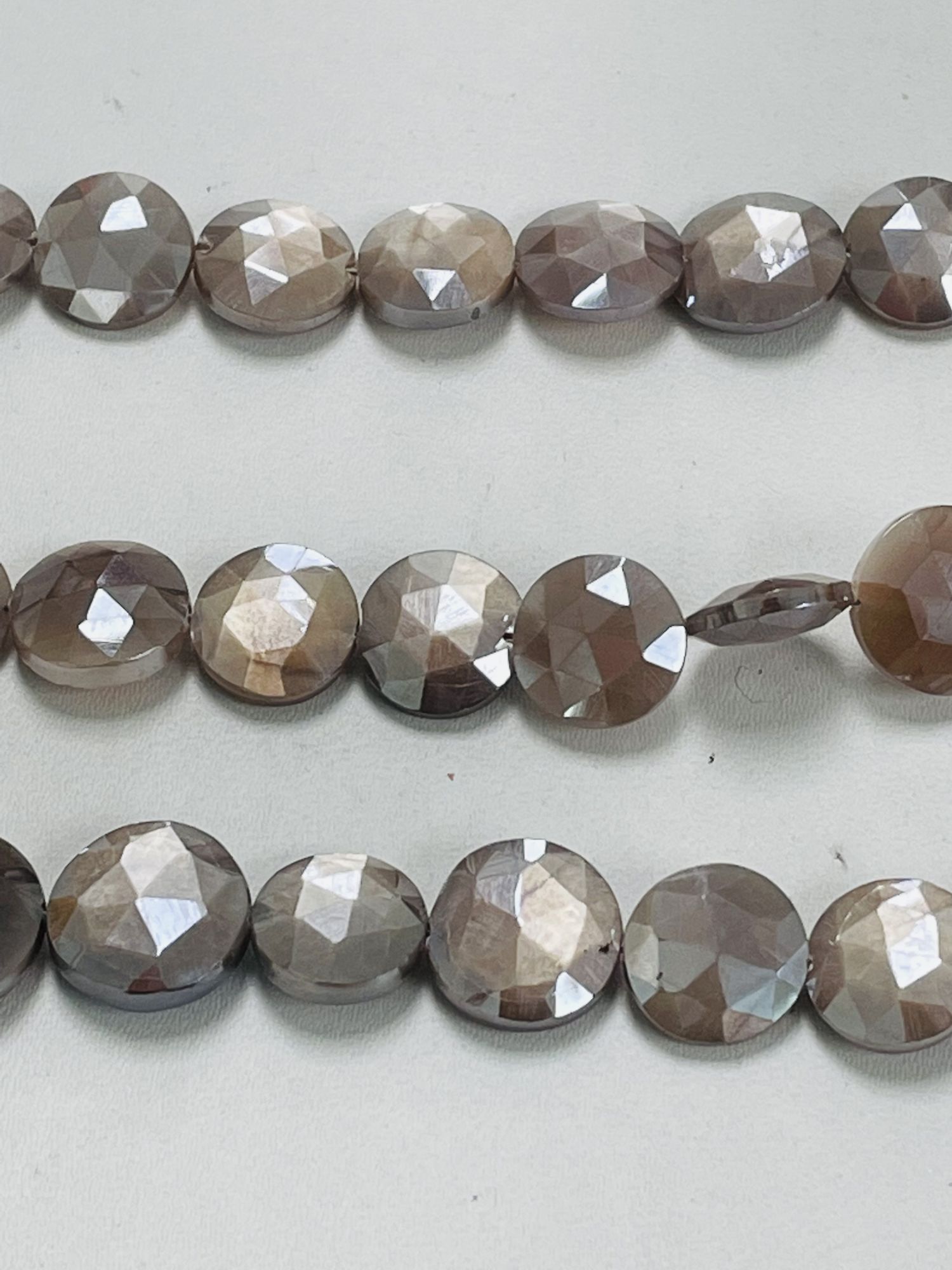 Coated Moonstone Coin Faceted