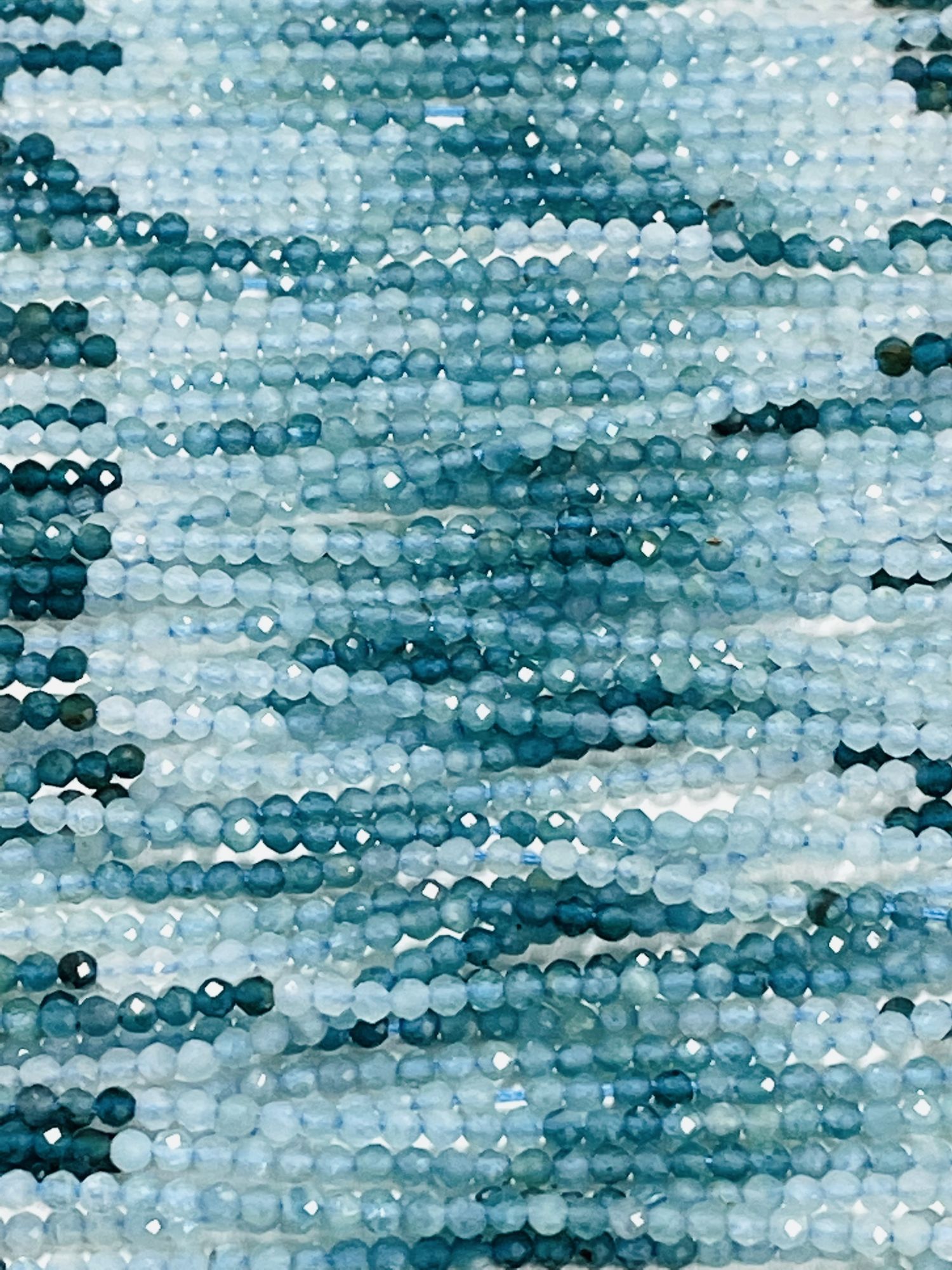 Shaded Grandidierite Rondelle Faceted