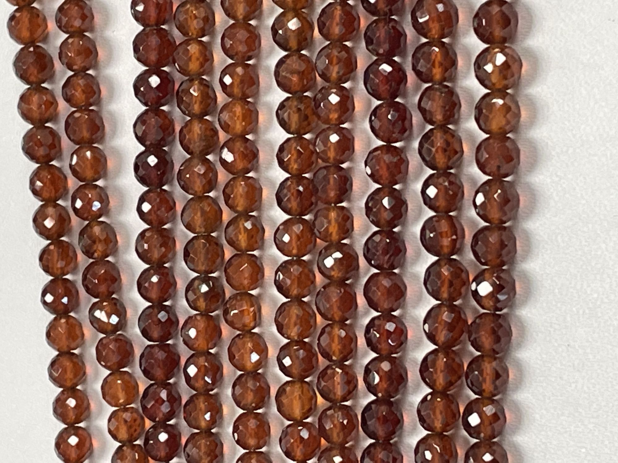 Hessonite Garnet Round Faceted