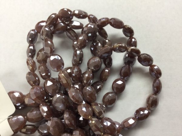 Coated Brown Moonstone Ovals Faceted