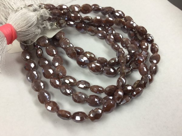 Coated Brown Moonstone Ovals Faceted