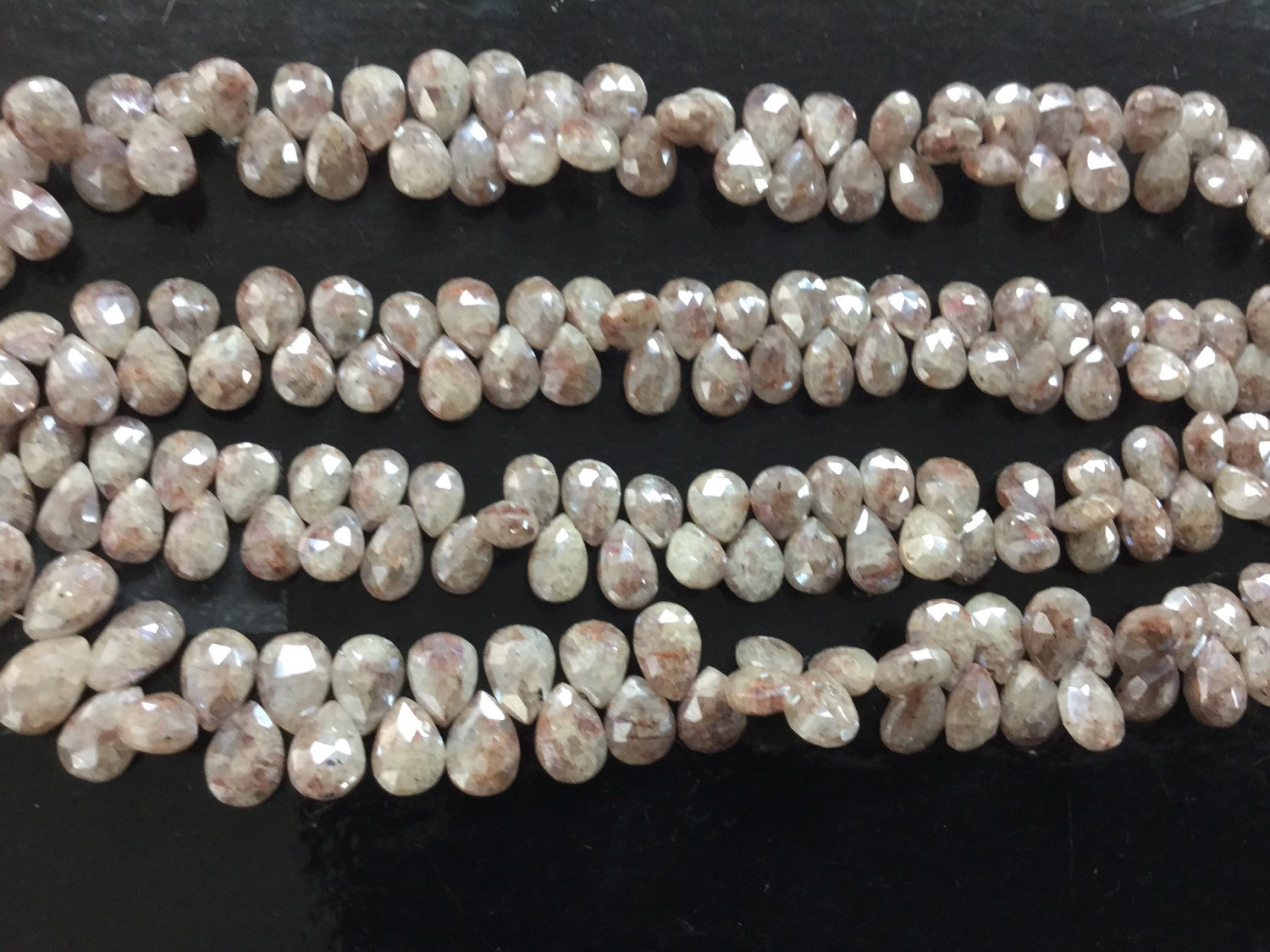 Coated Corundum Pears Faceted