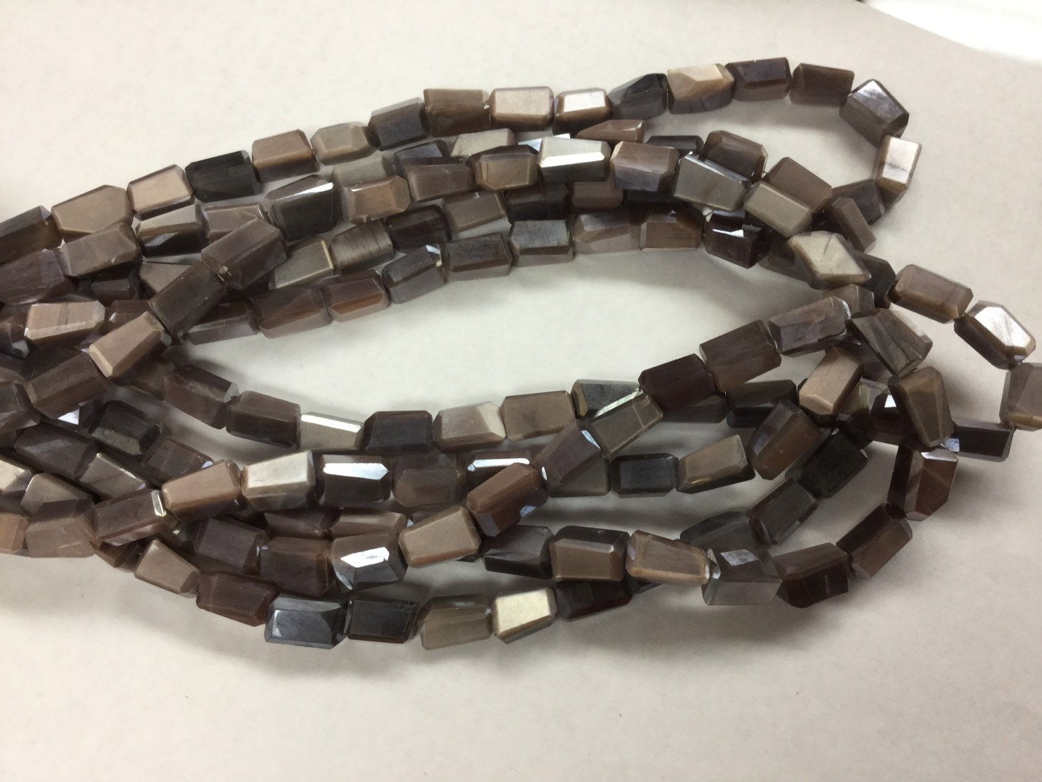 Coated Cream/Brown Moonstone Nuggets Faceted