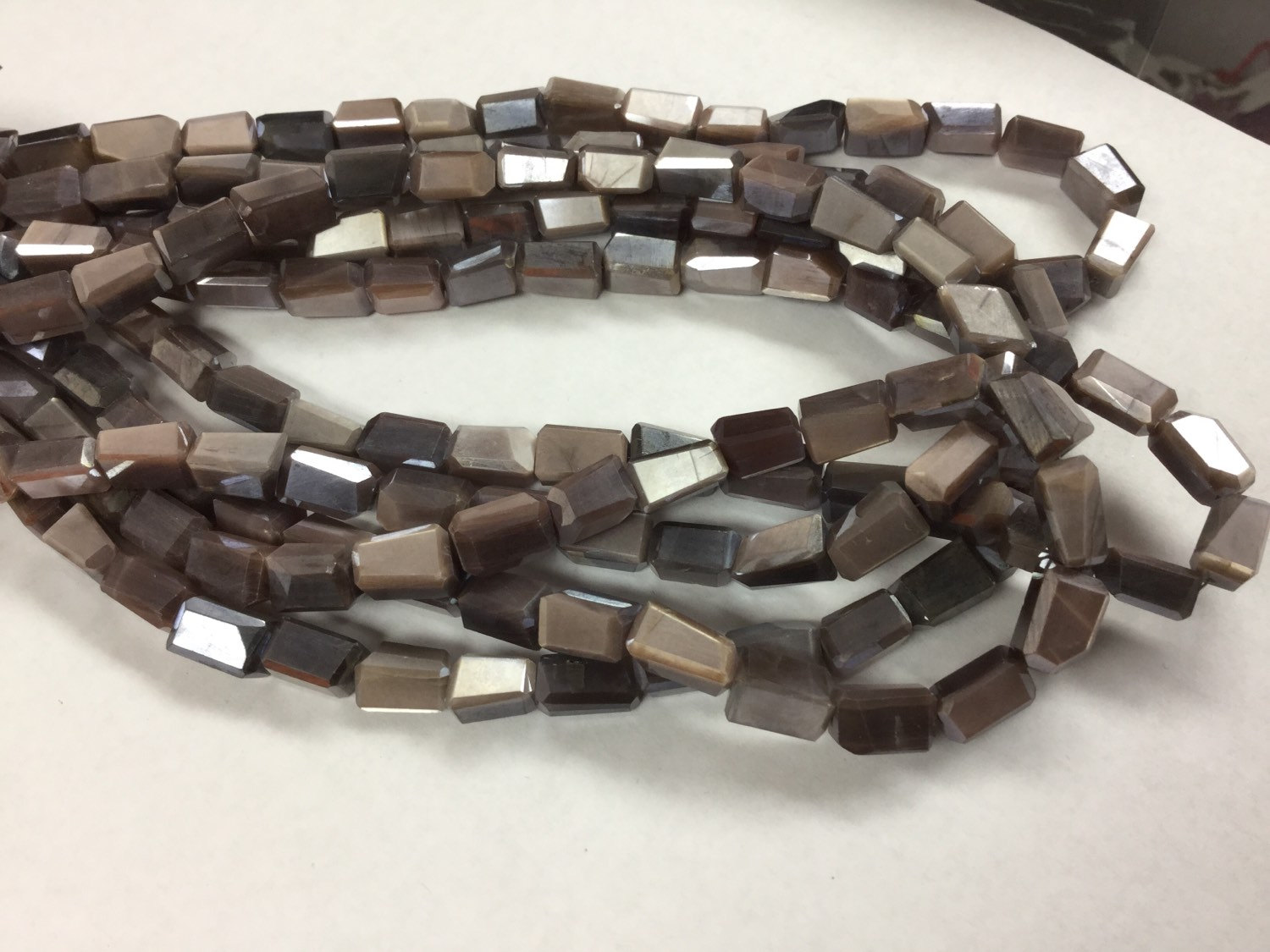 Coated Cream/Brown Moonstone Nuggets Faceted