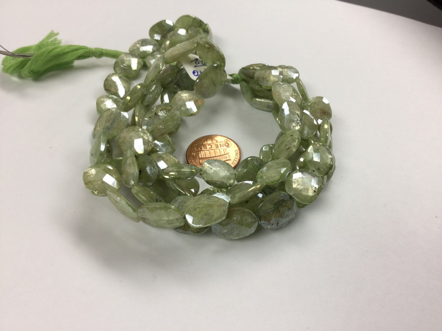 Coated Green Kyanite Ovals Faceted