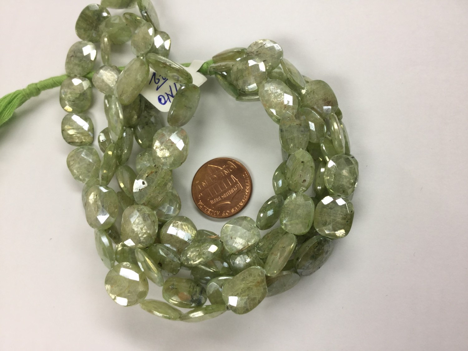 Coated Green Kyanite Ovals Faceted