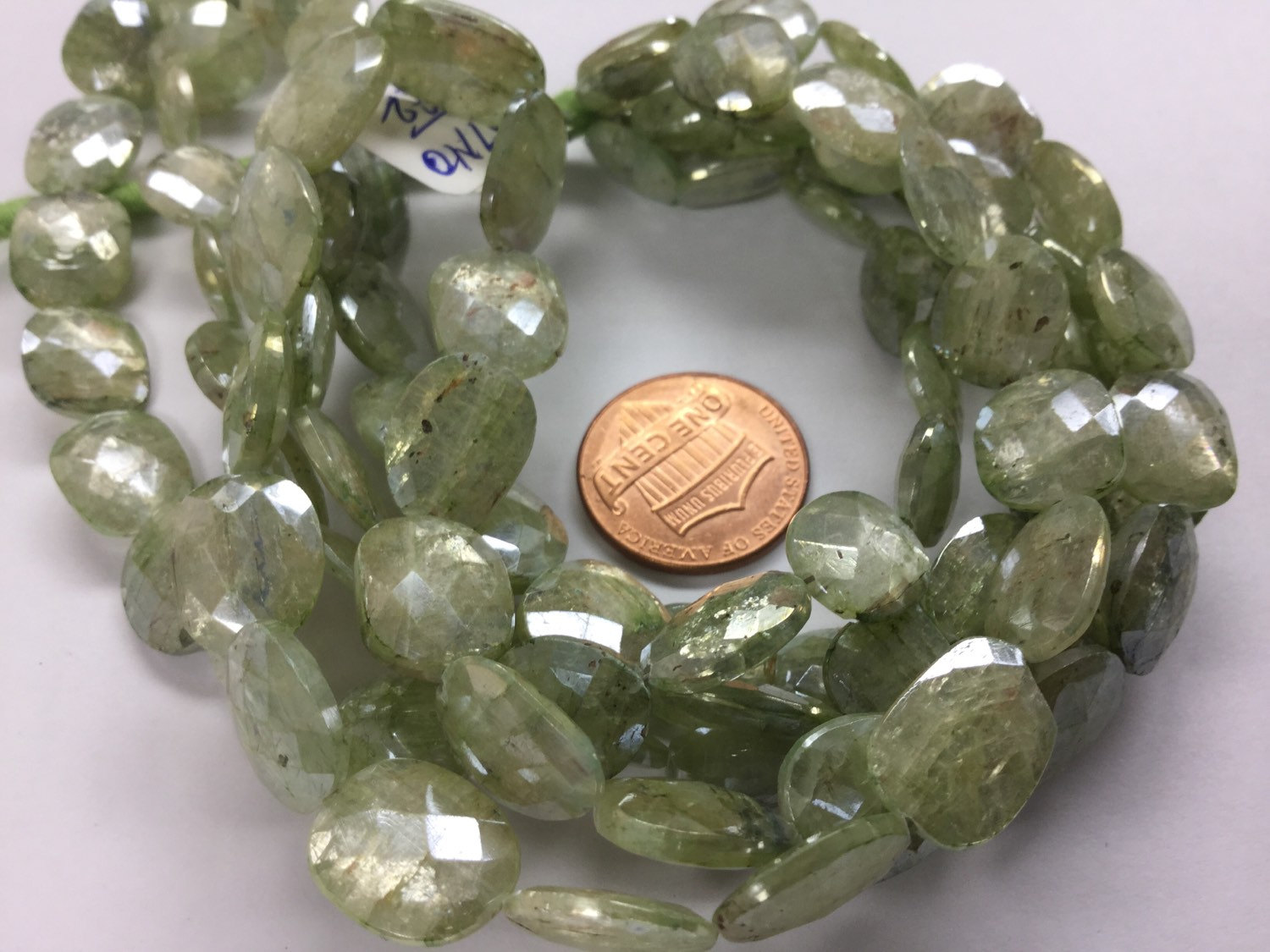 Coated Green Kyanite Ovals Faceted