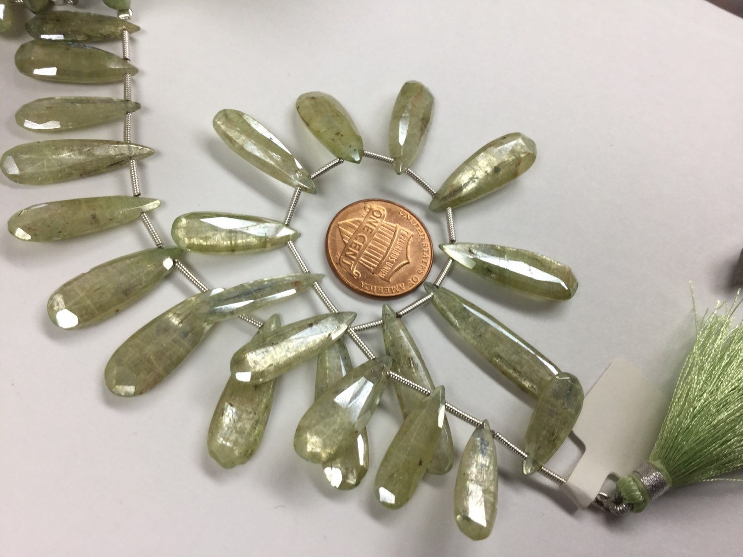 Coated Green Kyanite Pears Faceted