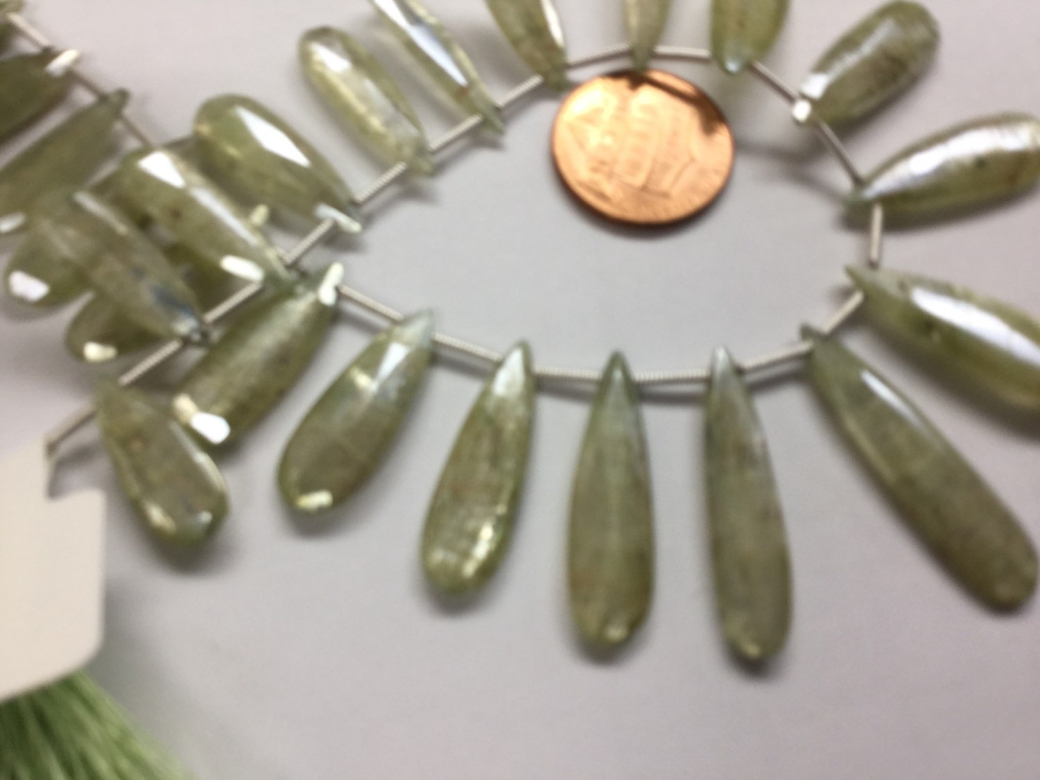 Coated Green Kyanite Pears Faceted