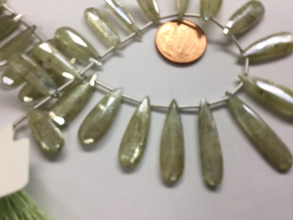 Coated Green Kyanite Pears Faceted