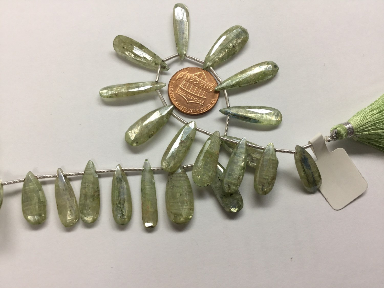 Coated Green Kyanite Pears Faceted