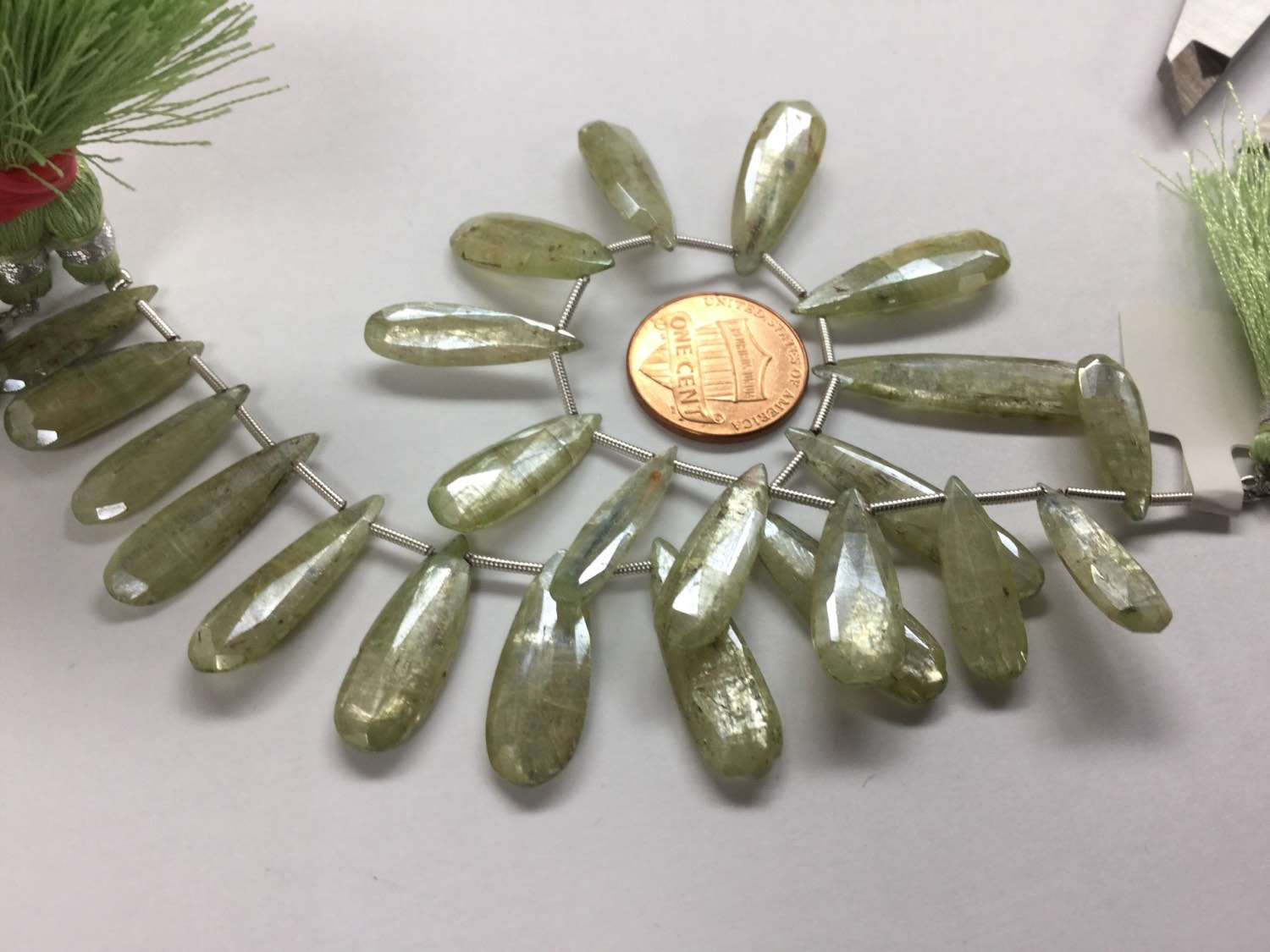 Coated Green Kyanite Pears Faceted