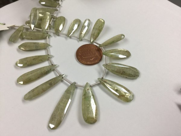 Coated Green Kyanite Pears Faceted