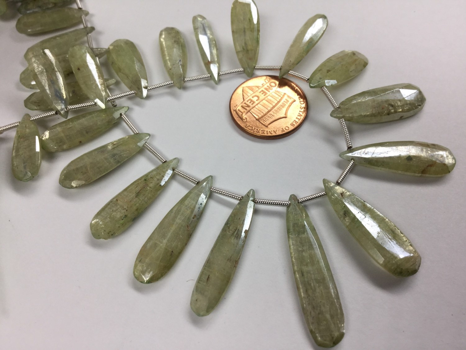 Coated Green Kyanite Pears Faceted
