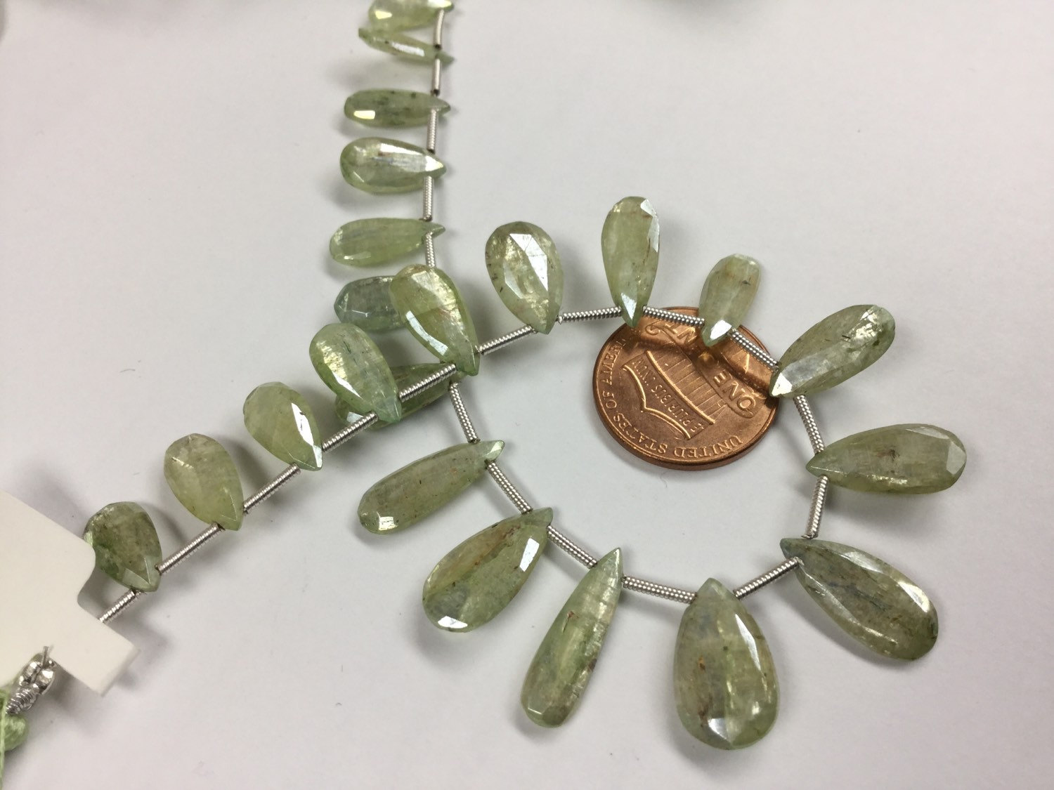 Coated Green Kyanite Pears Faceted