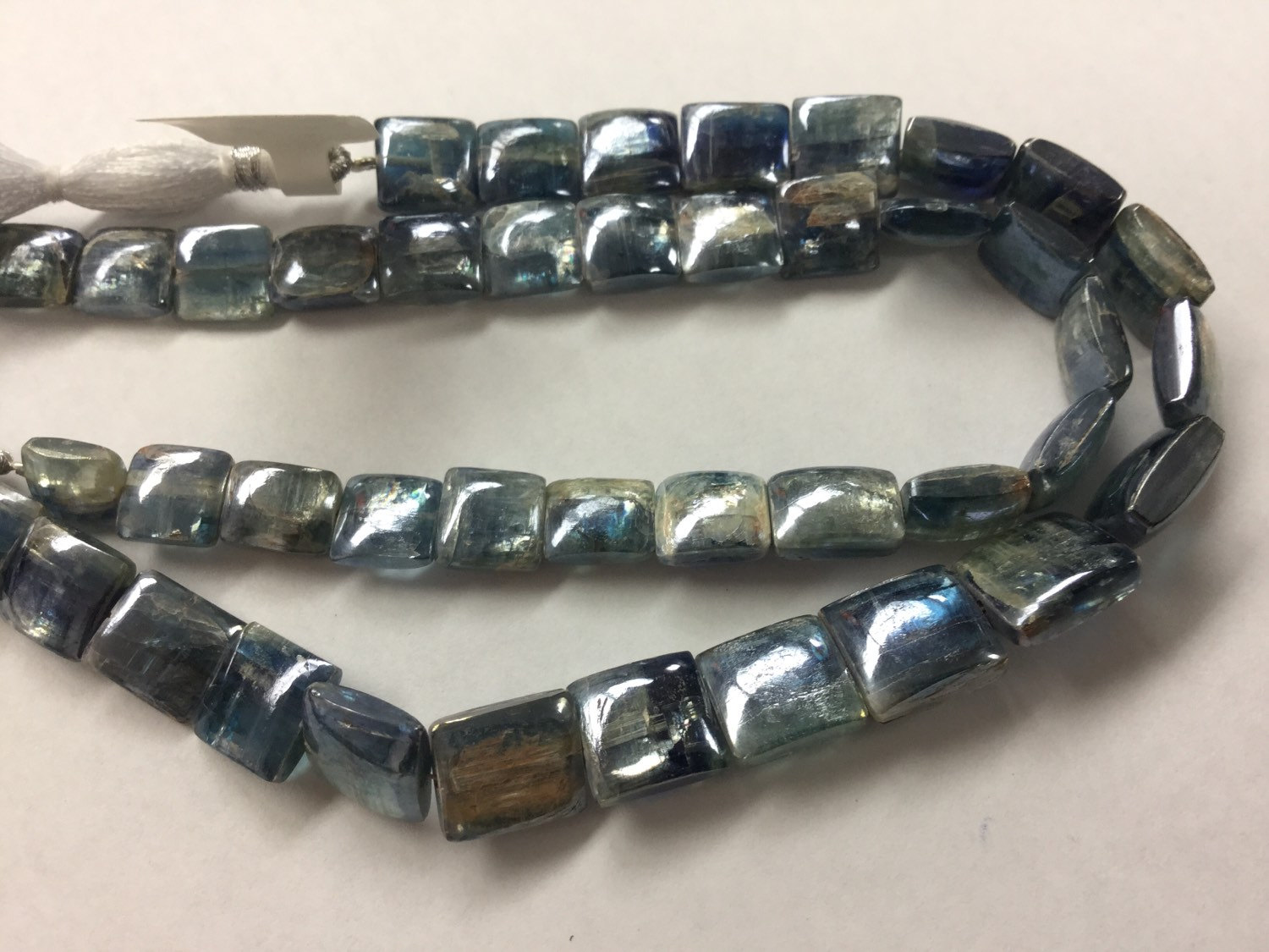Coated Kyanite Squares Faceted