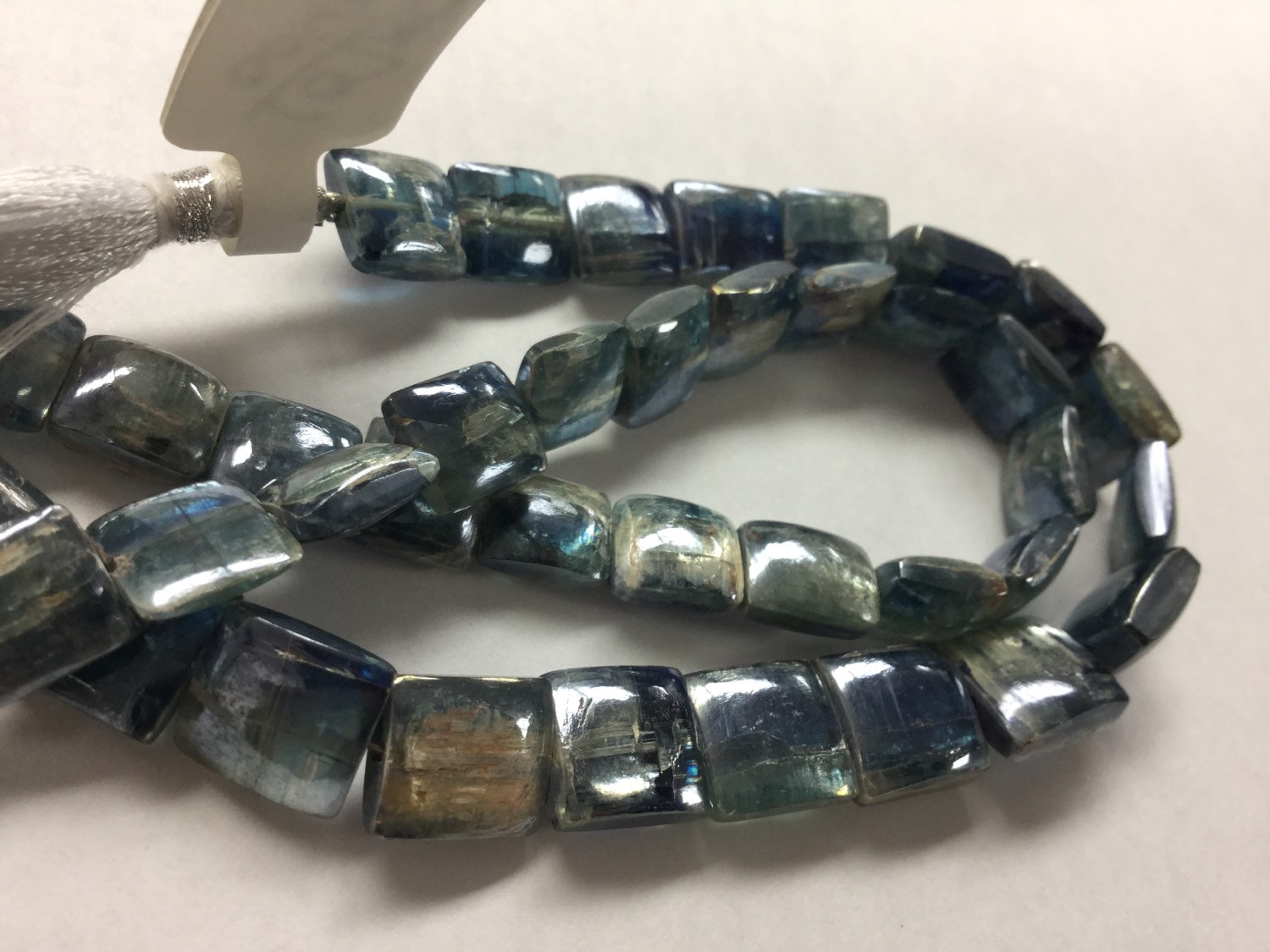 Coated Kyanite Squares Faceted