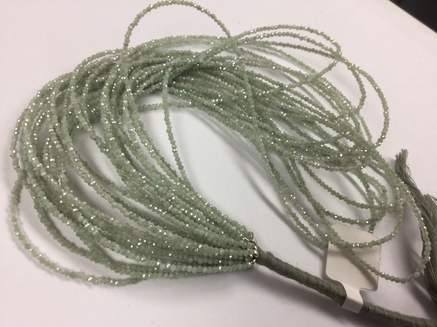 Coated Light Green Silverite/Corundum Rondelles Faceted