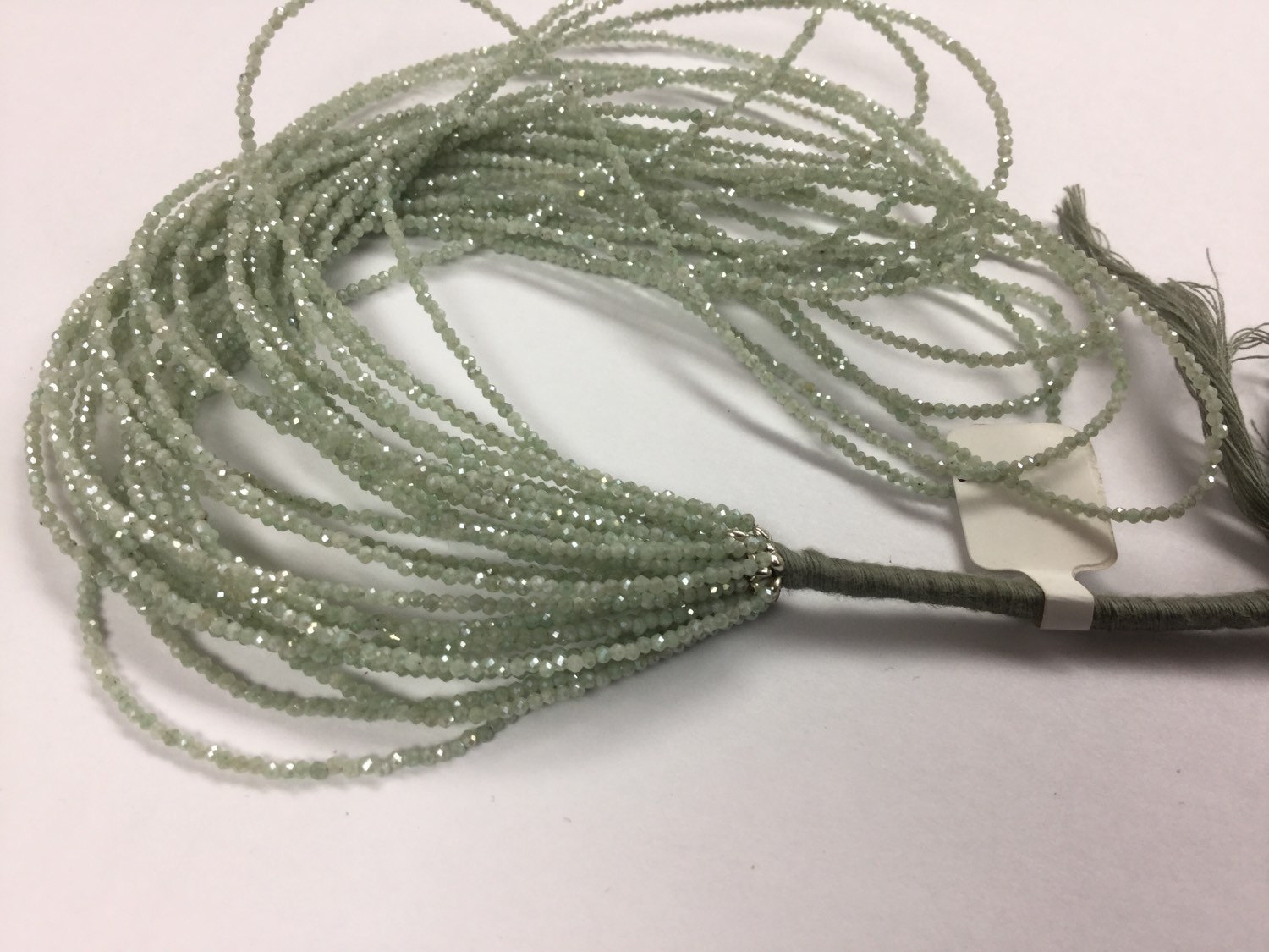 Coated Light Green Silverite/Corundum Rondelles Faceted